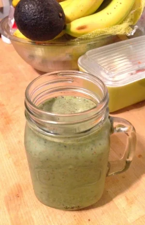 Kale, banana, blueberries, goji berries, plain yogurt, and coconut milk