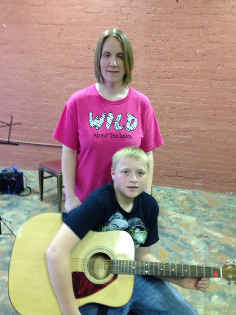 "We have been very pleased with the guitar lessons. Stuart is a very patient teacher, he works well with all ages. The style of teaching that is used is well rounded and seems to work great for all learners. The materials are much easier to learn from and allow students to play actual songs much quicker. When my son first started learning from his guitar lessons book, he seemed to lose patience. This has been a great experience. and we definitely plan to continue!" -Stacey Power "I like how Stuart teaches the guitar lessons and how I can play my favorite songs a lot quicker. I am very glad I started taking his group lessons." -Carson Power