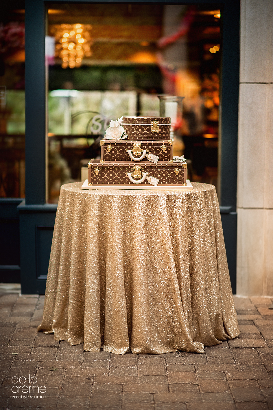 3-tier Louis Vuitton themed wedding cake covered in fondan…