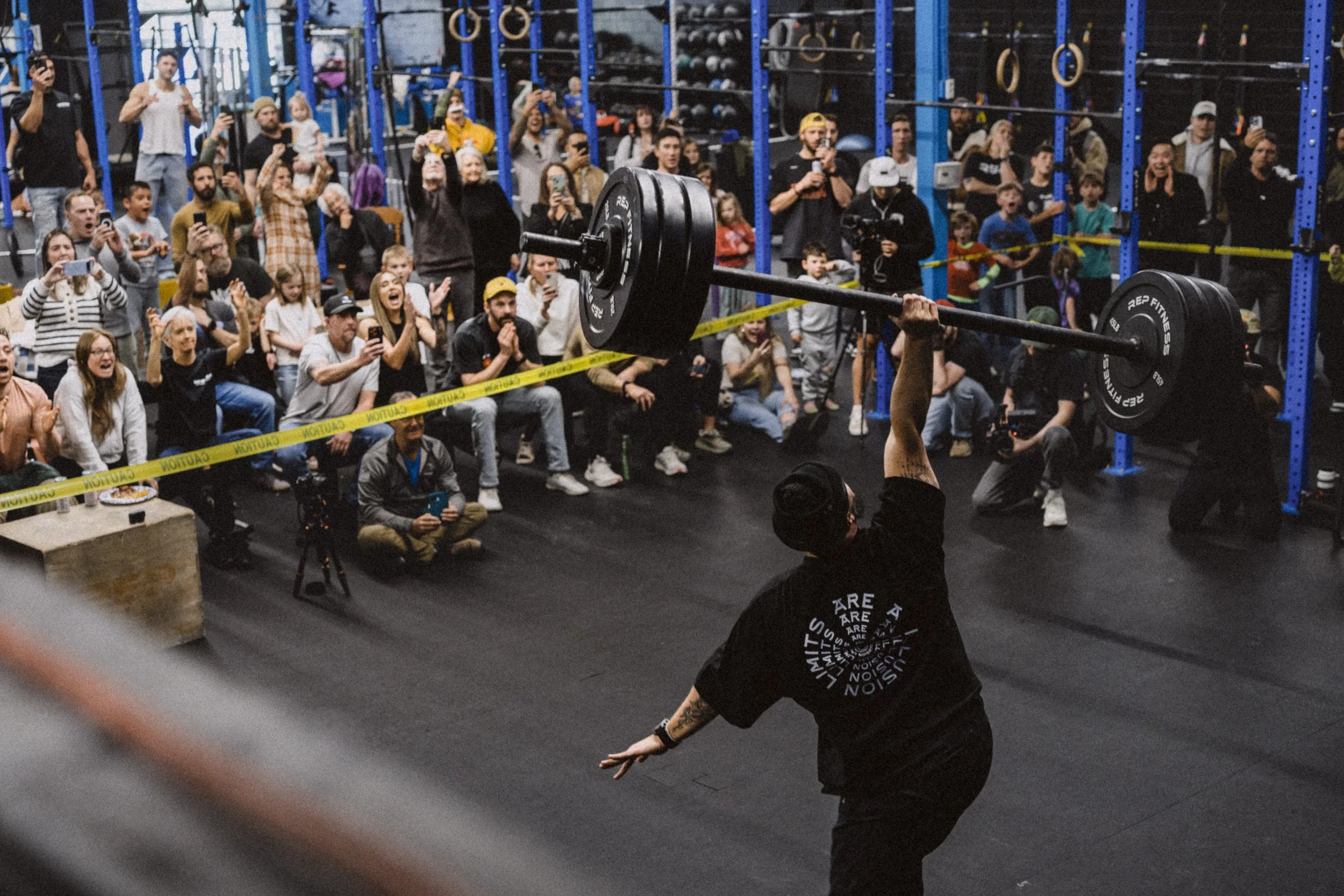 Mike Aidala defending his Guinness World Record for heaviest single rep Turkish get-up at 261.3 lbs on February 23 2026 in Denver Colorado