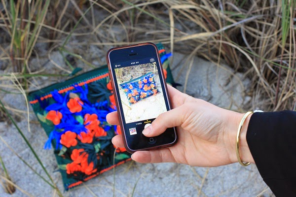 Me, photographing a clutch for a blog post.