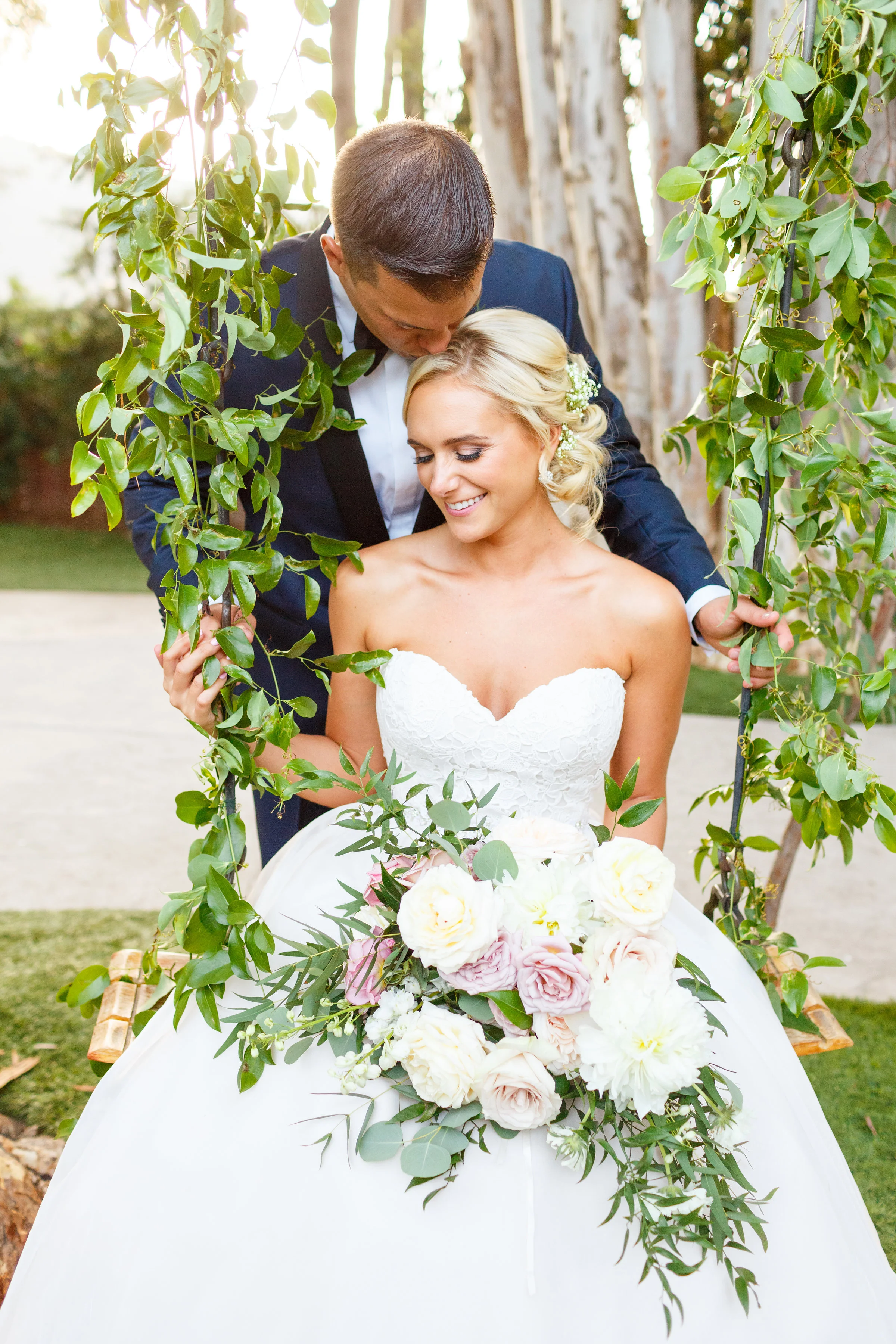 Wedding swing flowers.jpg
