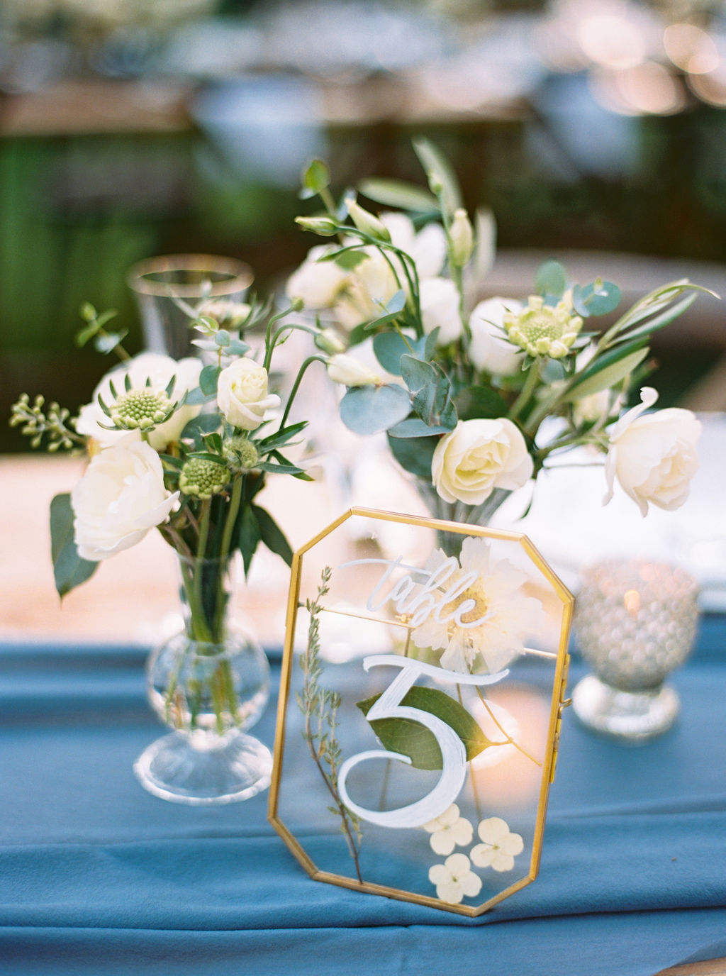 white bud vase centerpiece flowers.JPG