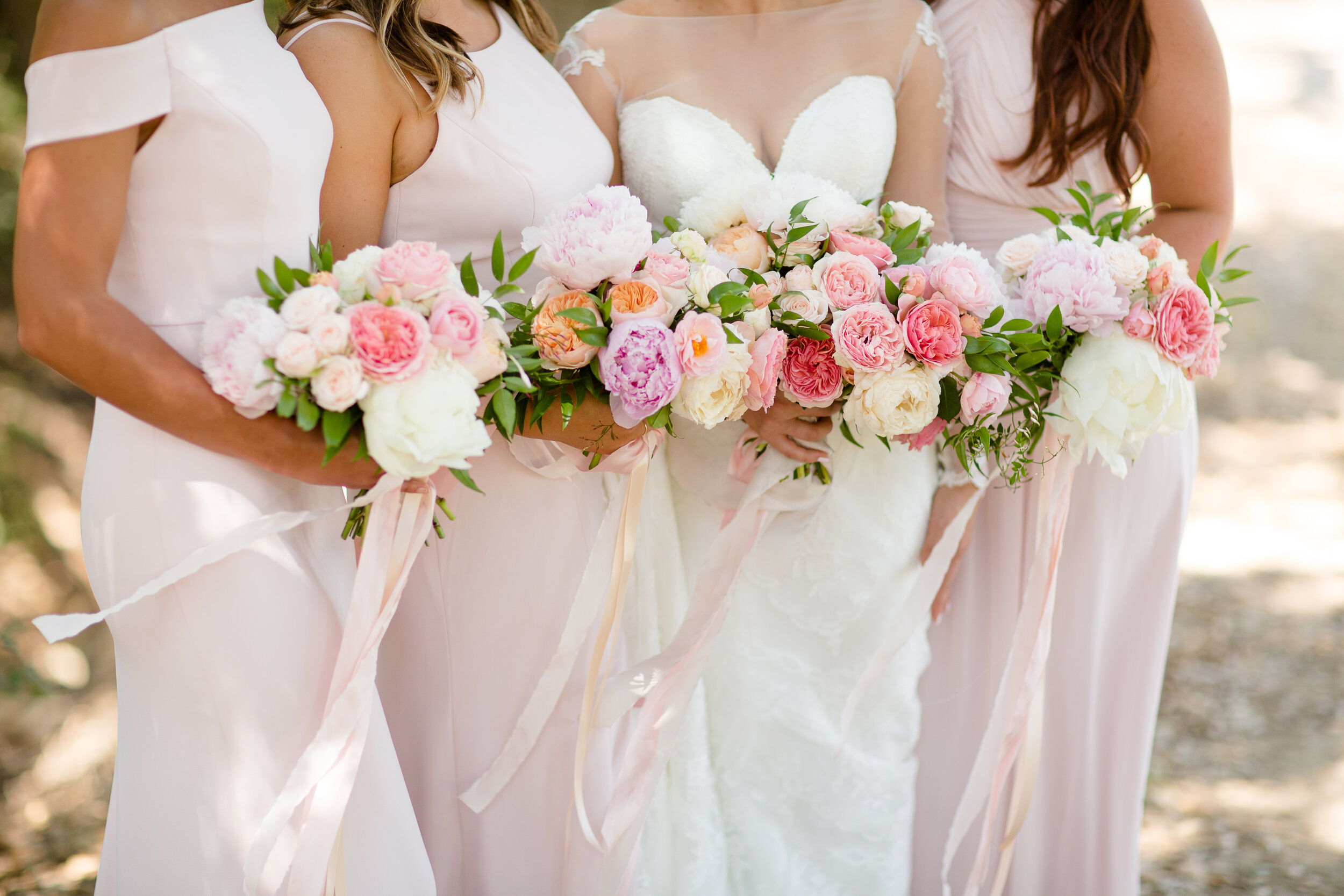 3 blush bridesmaids bouquets.jpg