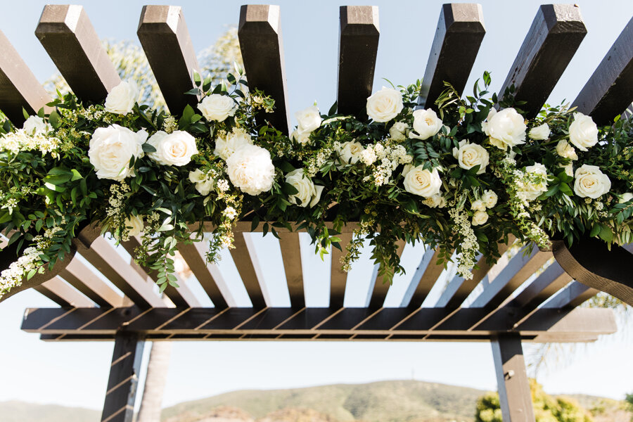15 white ceremony arch flowers.jpg