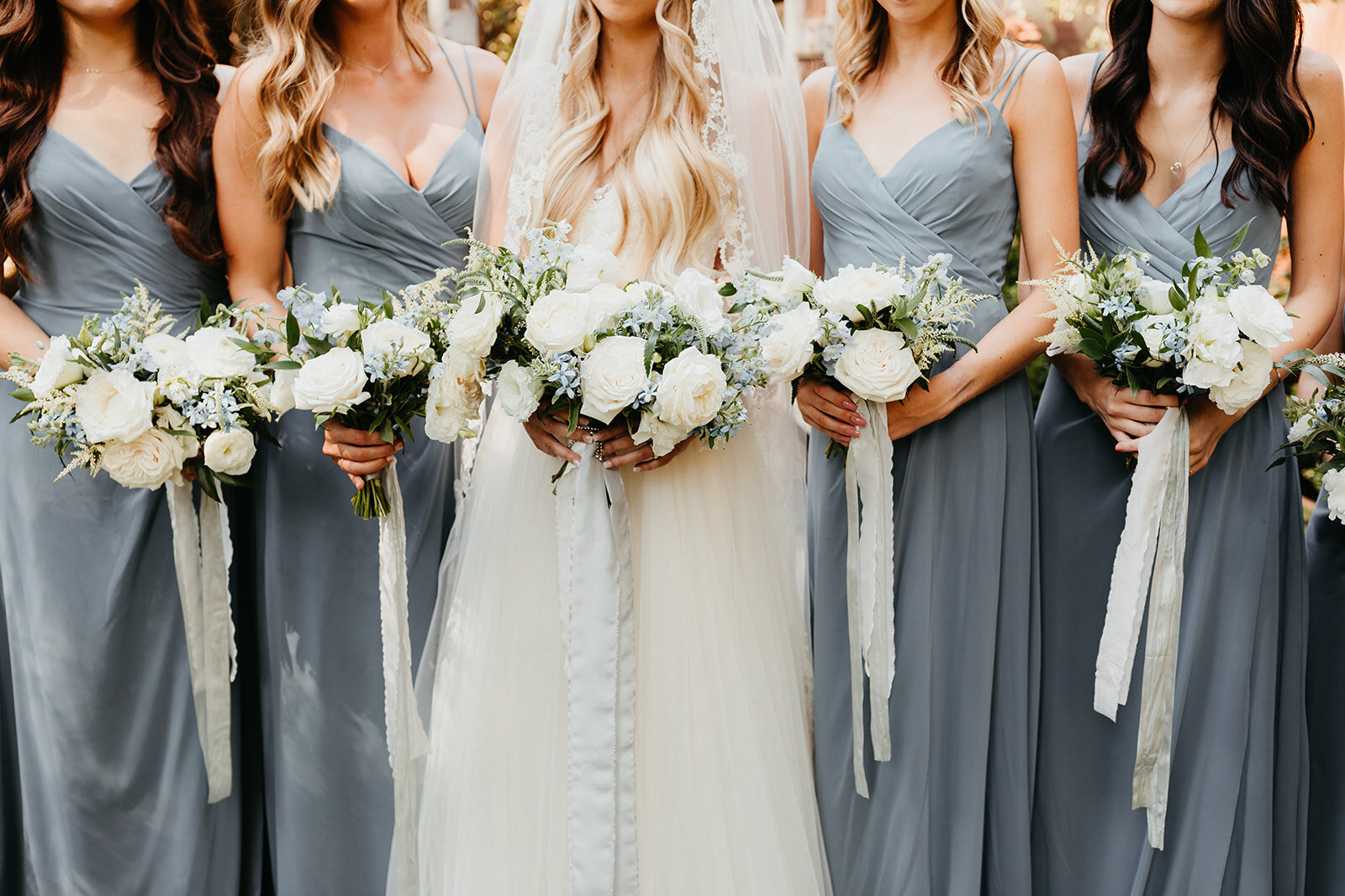 white blue bridesmaid bouquets.jpg