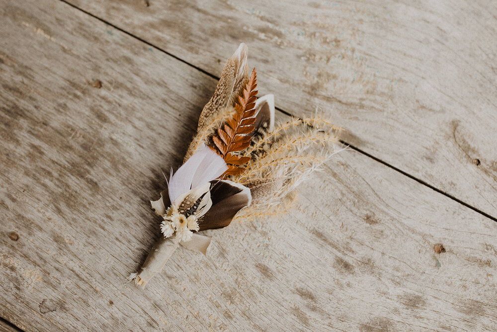 feather boutonniere 1.jpg