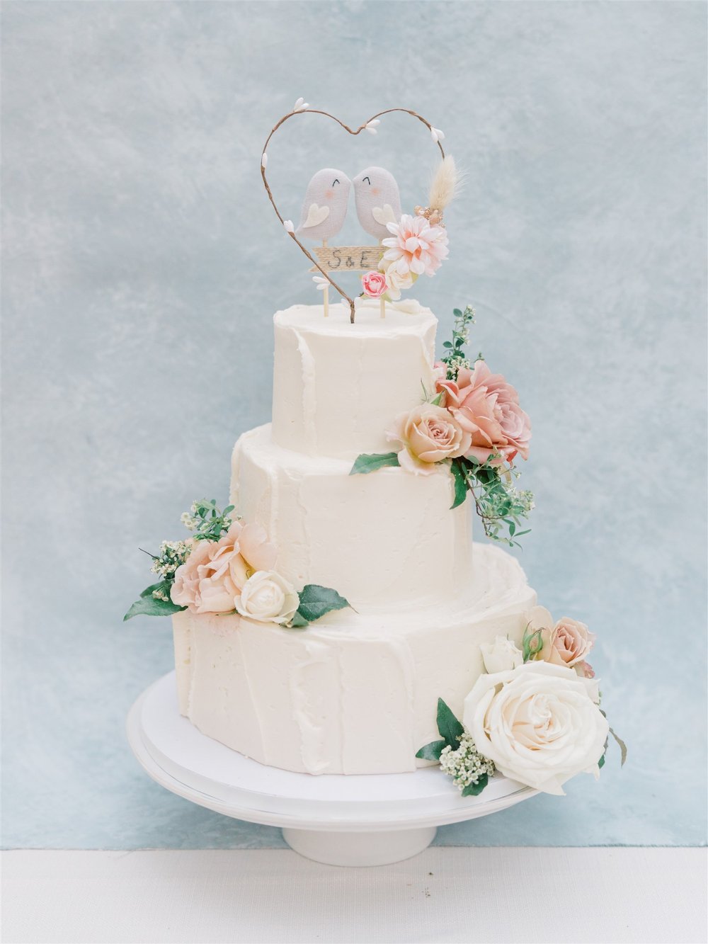 wedding cake flowers mauve.jpg