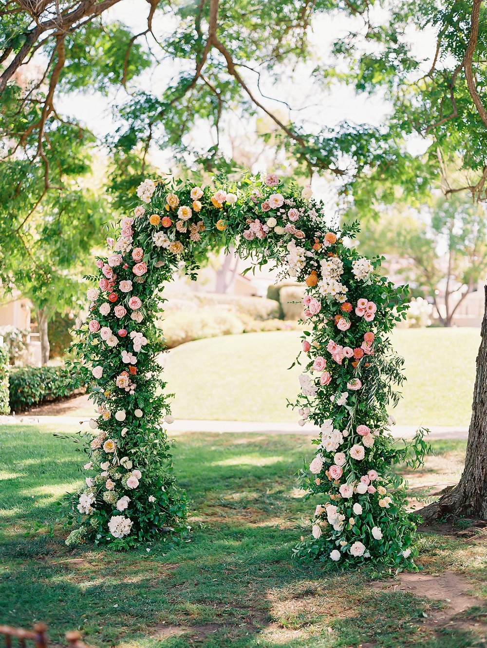 curved arch garden flowers.jpg
