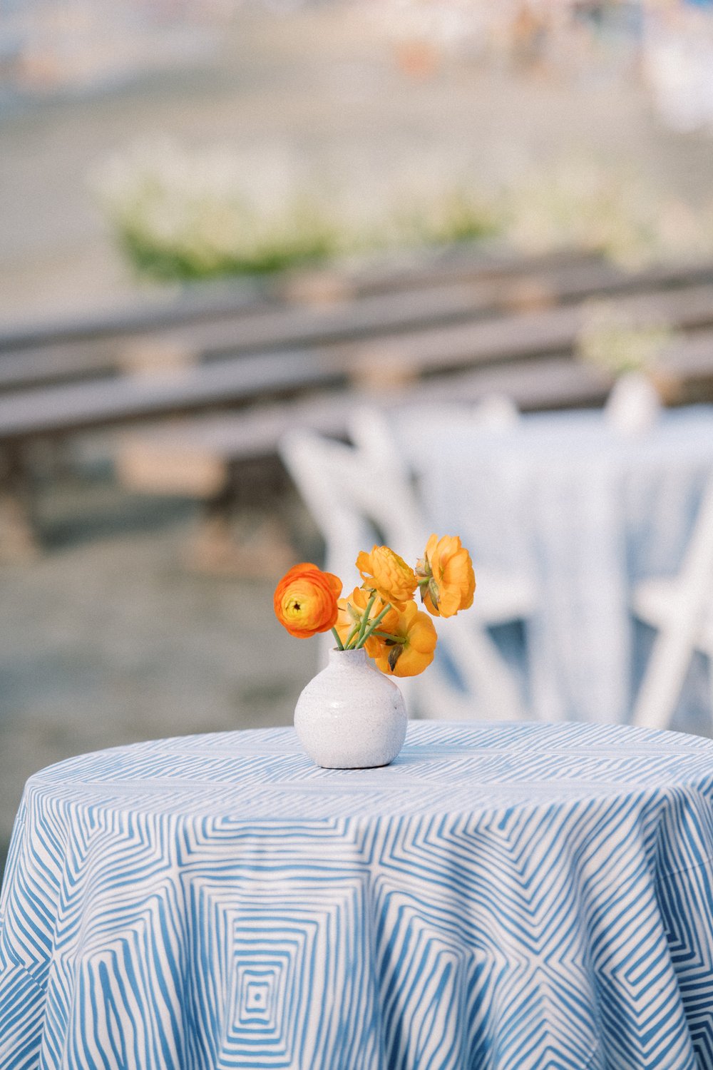 orange bud vase flowers.jpg