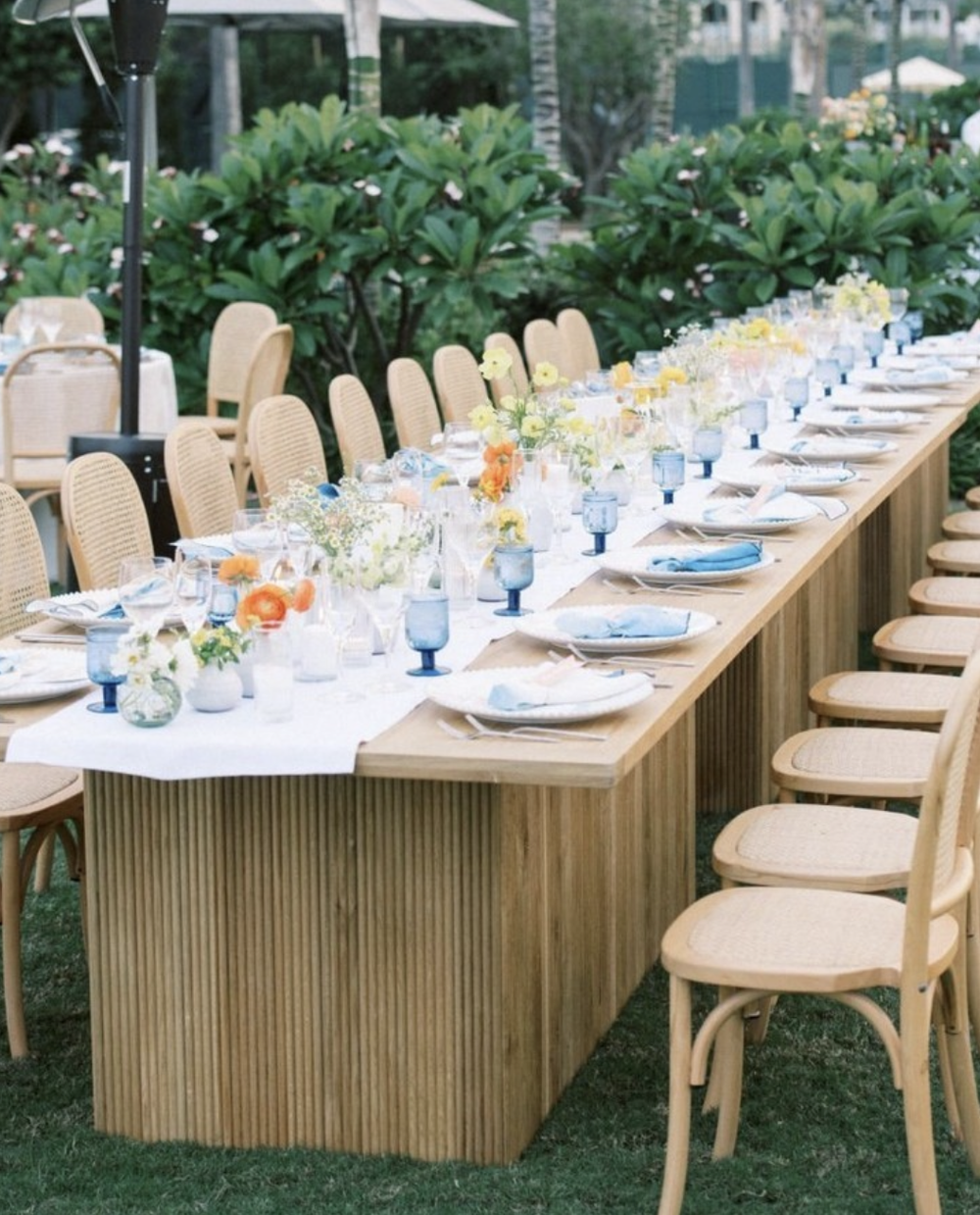 peach and yellow long table flowers.png
