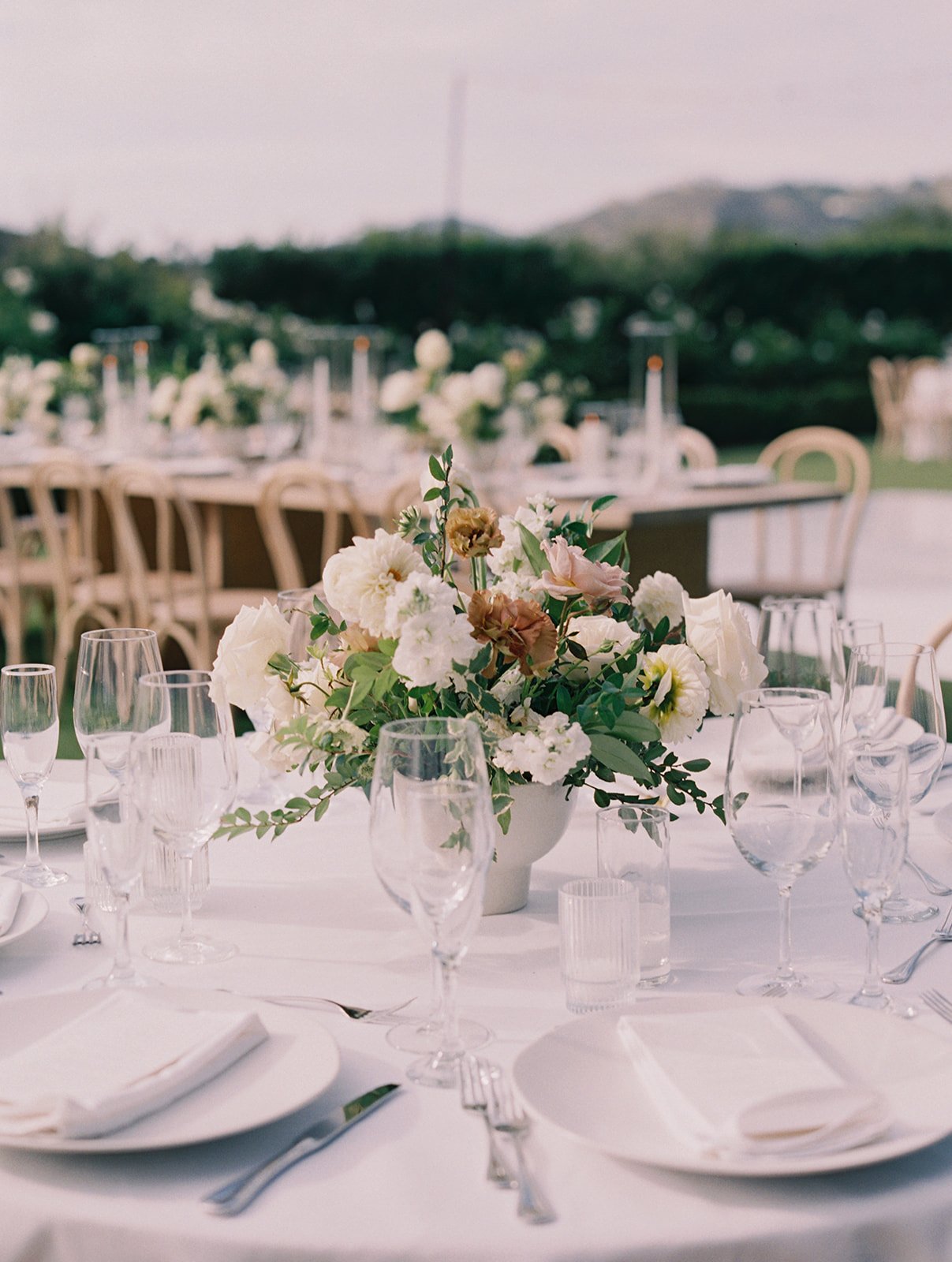 white tan garden style centerpiece.jpg