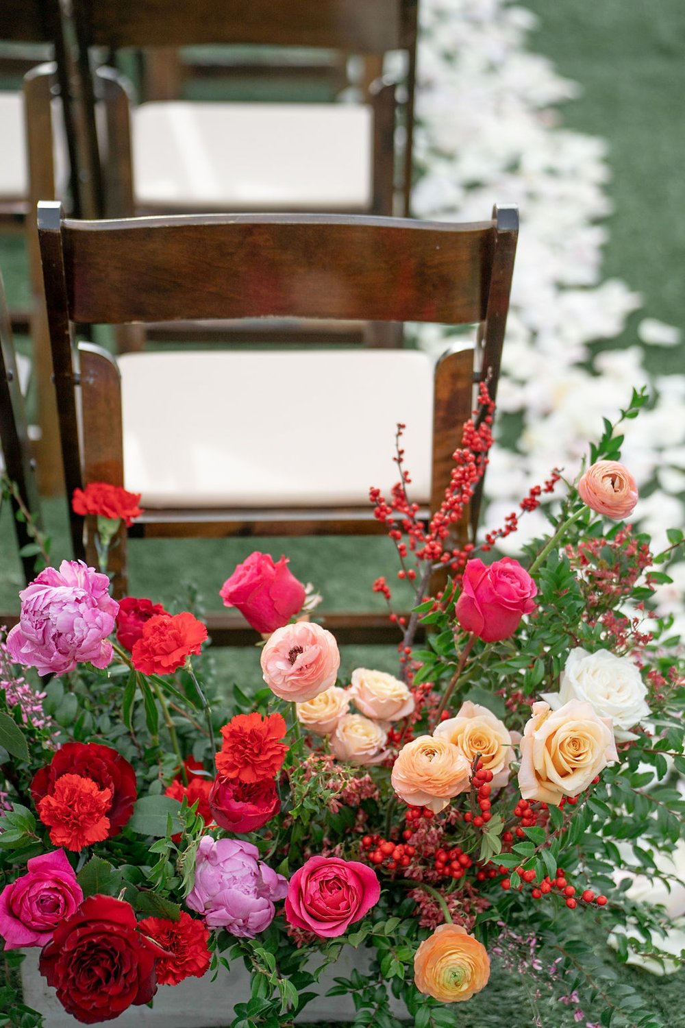 red and peach aisle flowers.jpg