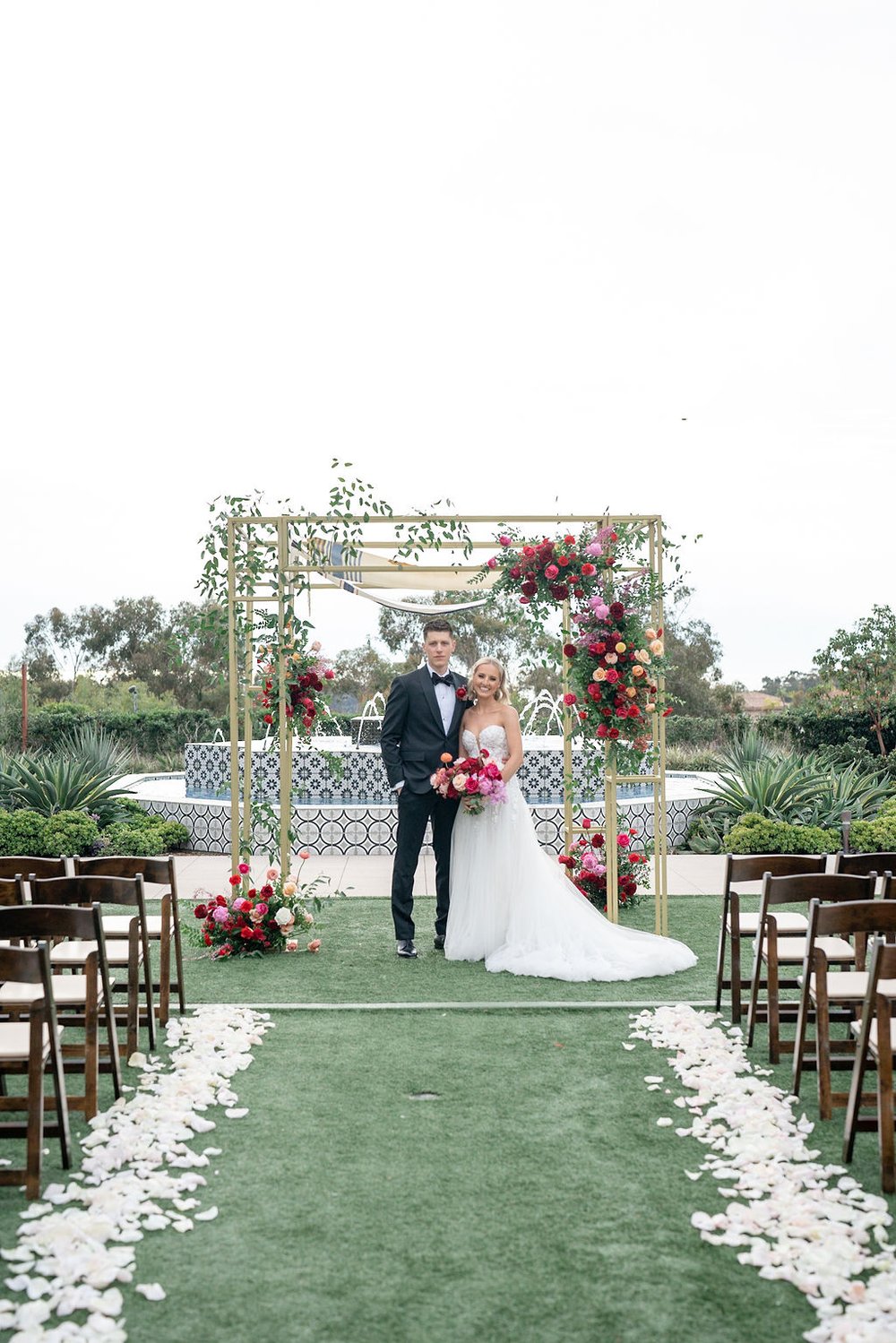 red and pink ceremony flowers.jpg