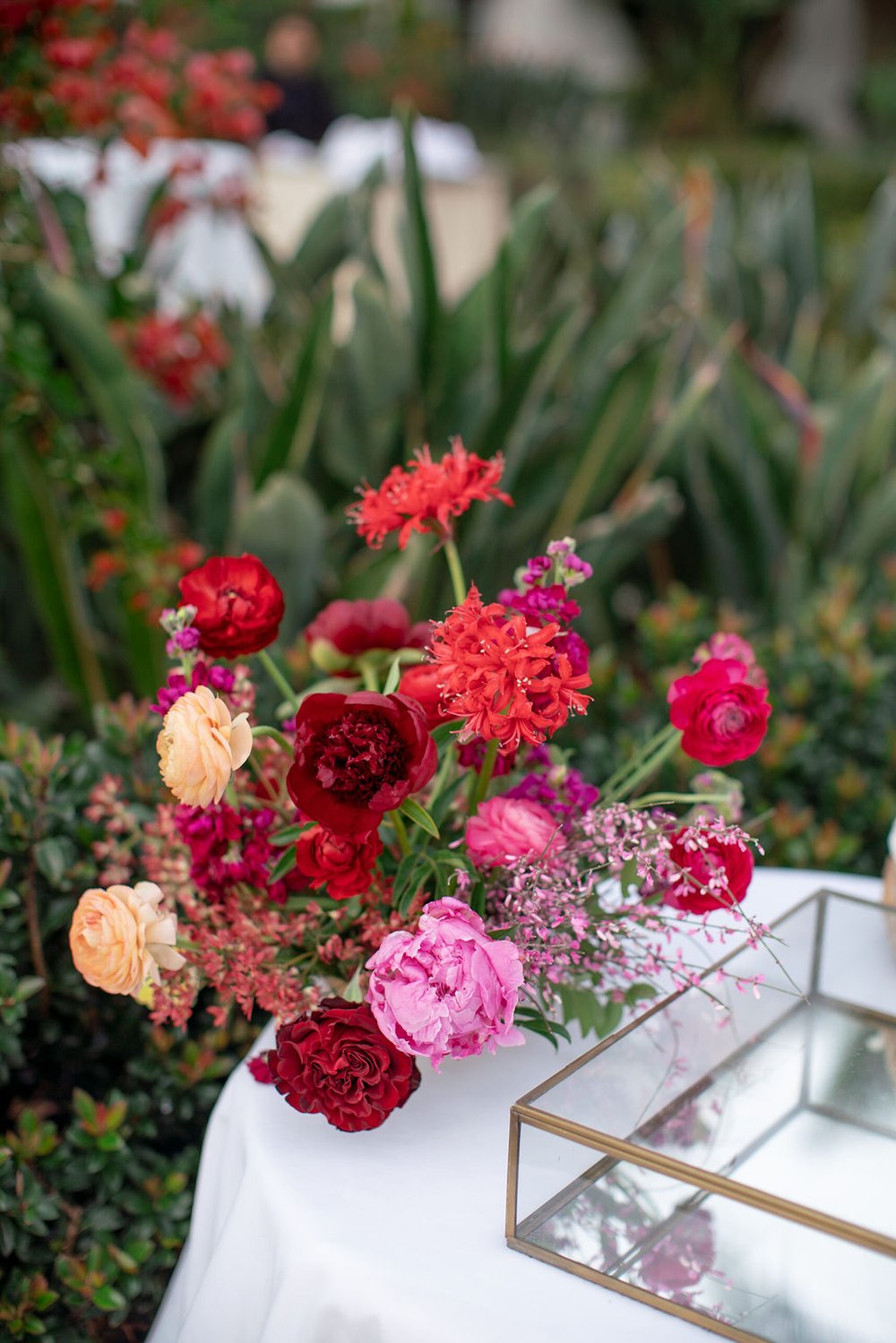 red and pink welcome table flowers.jpg