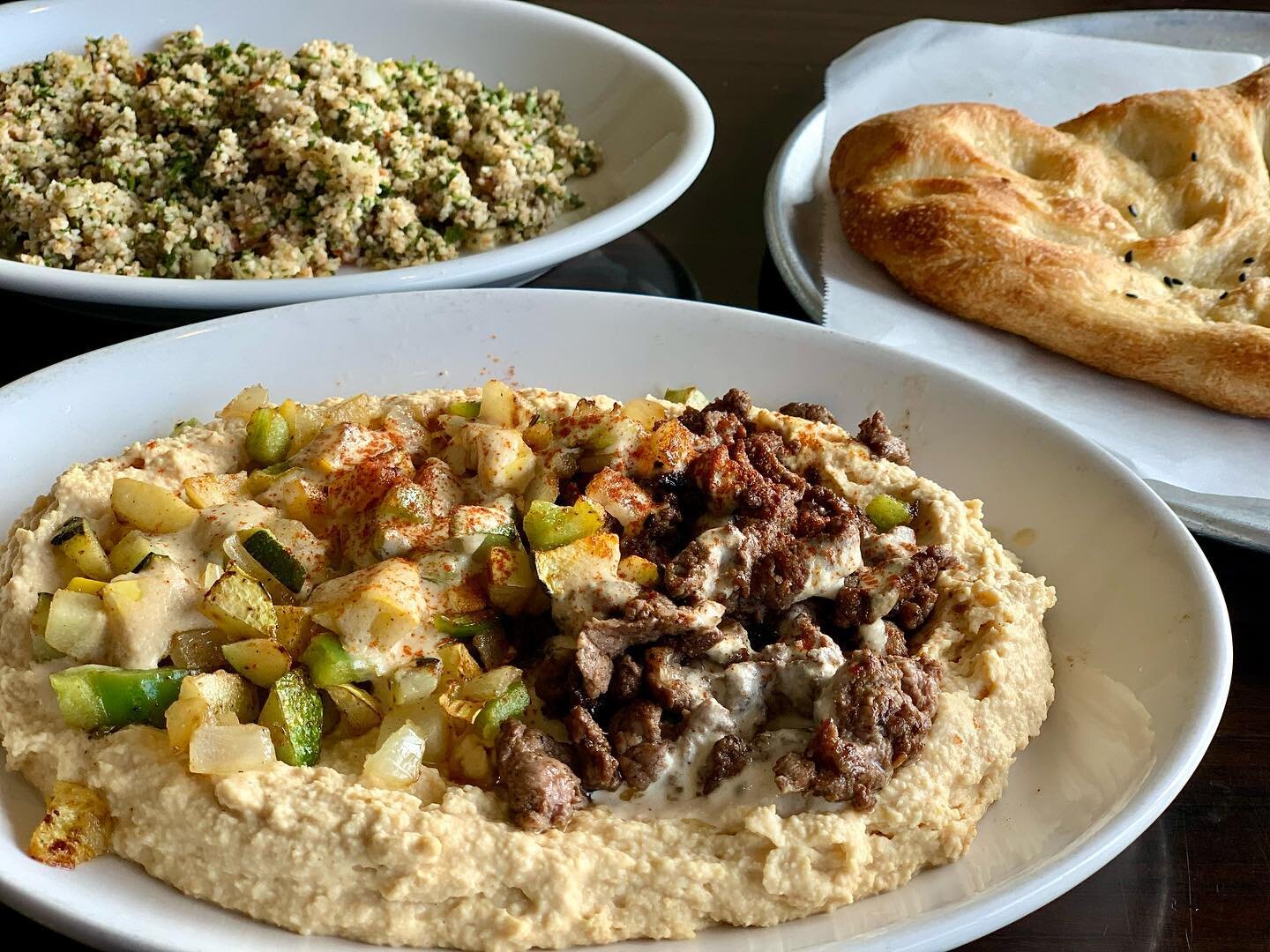 Happy International Hummus Day! 💛 Come enjoy some delicious hummus at Green Olive today! 📸: Turkish Hummus Lamb + Grilled Veggies, Pide (homemade flatbread), and Tabbouleh #hummusday 🤤
 

#supportsmallbusiness #mediterraneanfood #turkishfood #humm