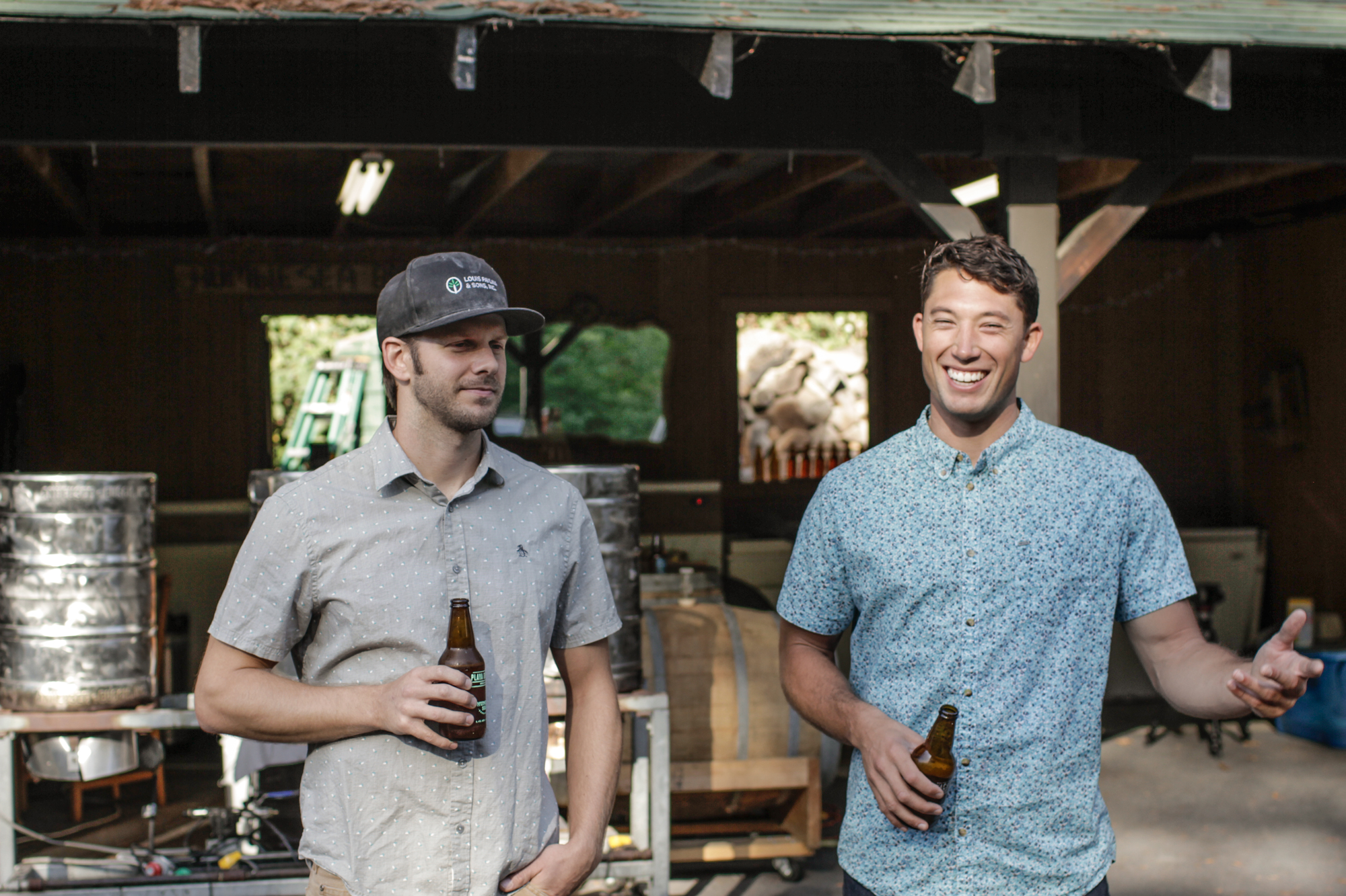 Taylor West and Nick Pavlina celebrating over a couple Humble Brews