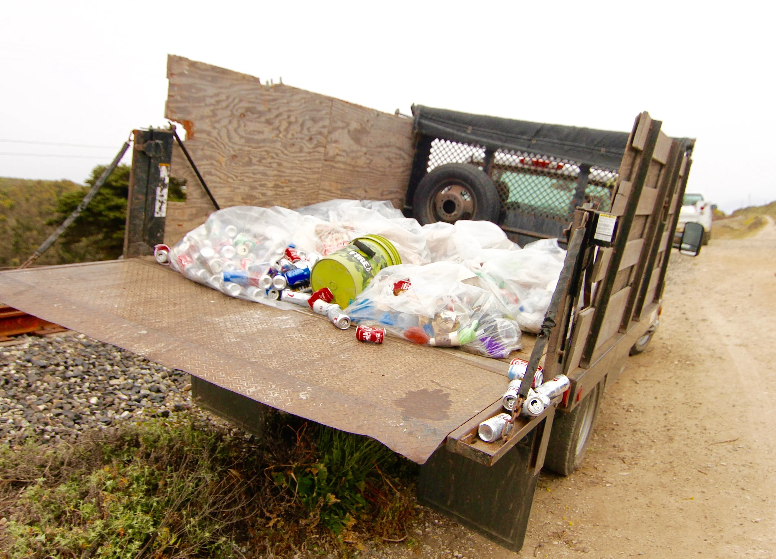 This is a portion of the leftovers picked up at Panther Beach: a few beer cans, an old tire, a plastic bucket, along with a bunch of other not so sweet items. 