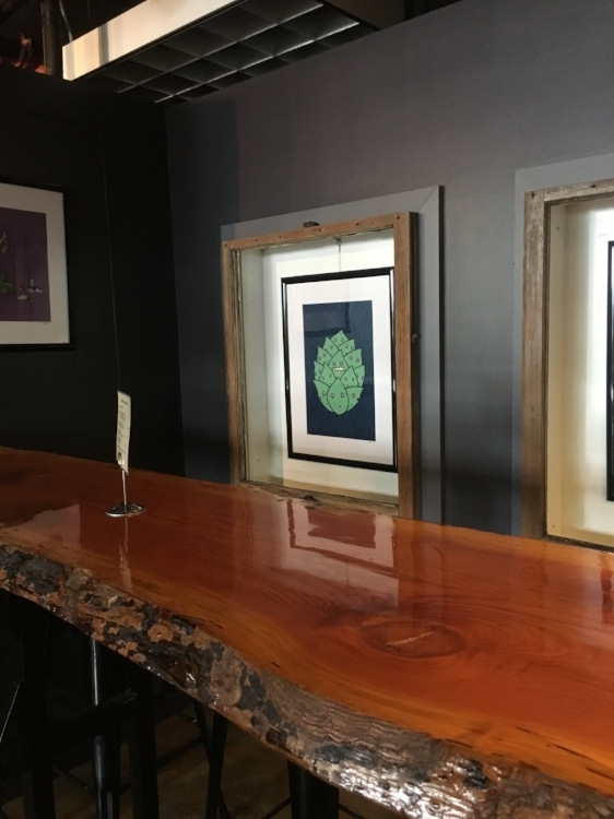 This corner intrigued us. The dark, 3/4 wall made the place feel smaller than it would have otherwise. The artwork was like that artwork in your house from that friend of yours who everyone thinks should get paid to make art for a living. 