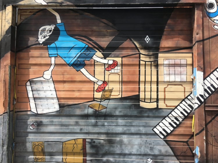 We found this interesting mural on the way. Anyone know a good muralist?