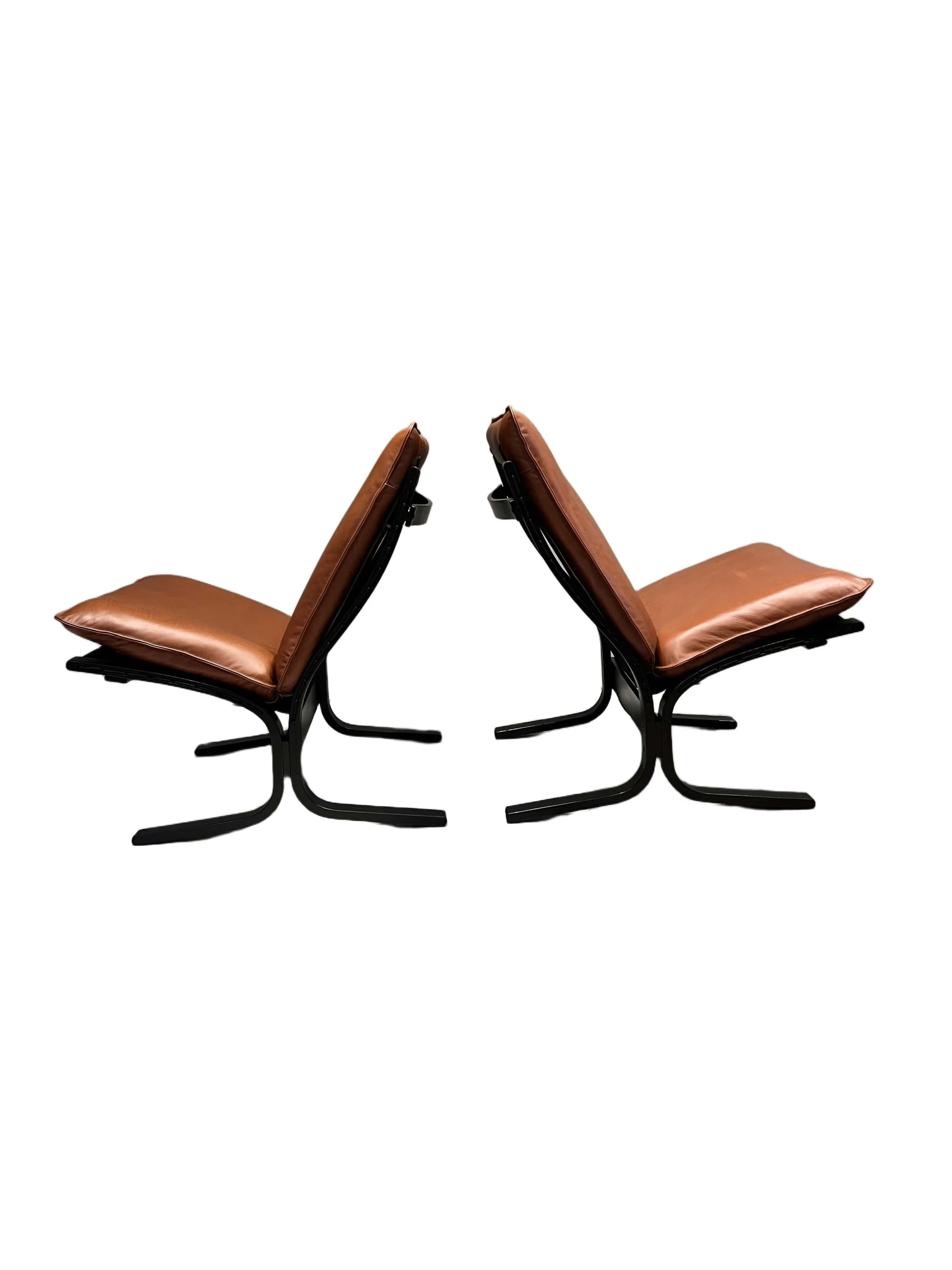mid-century-bentwood-leather-lounge-chairs.jpg