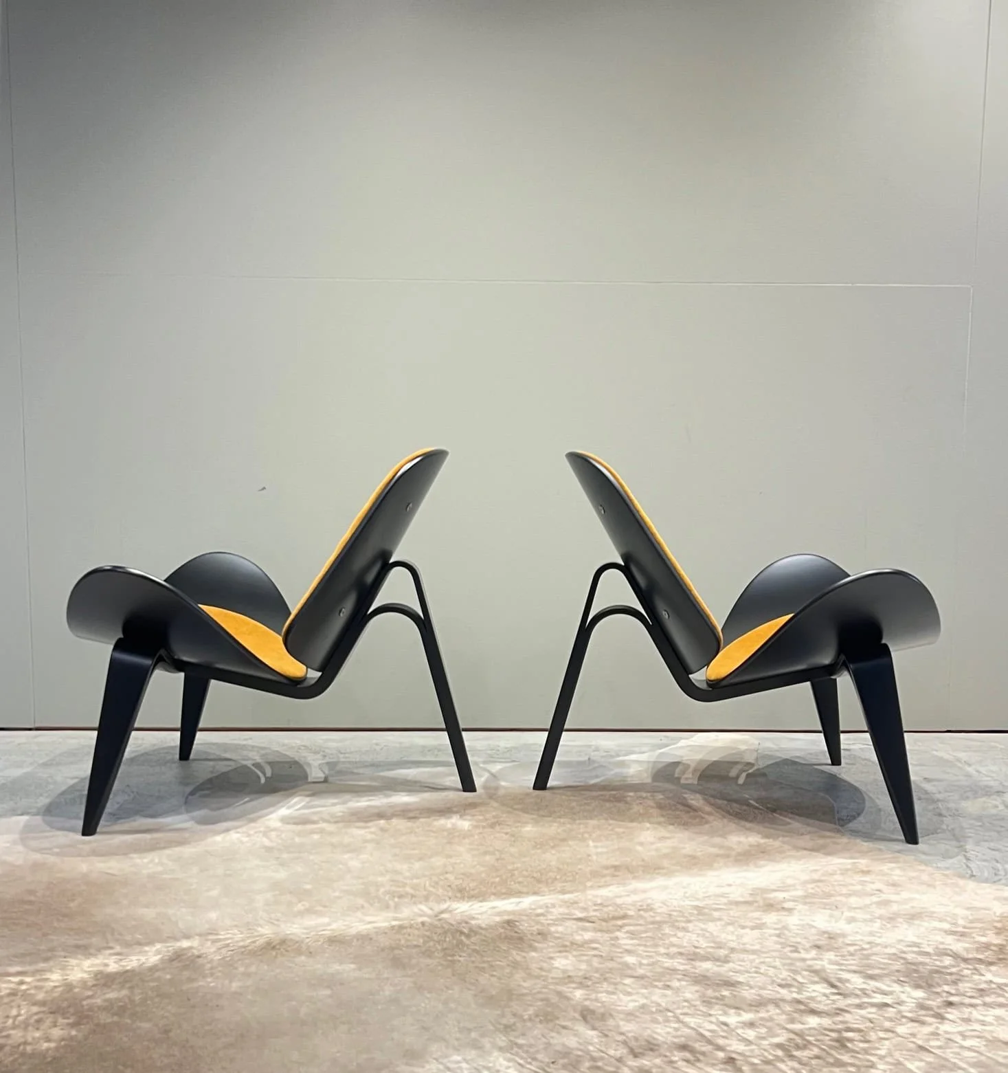 pair of matching hans wegner chairs.jpg