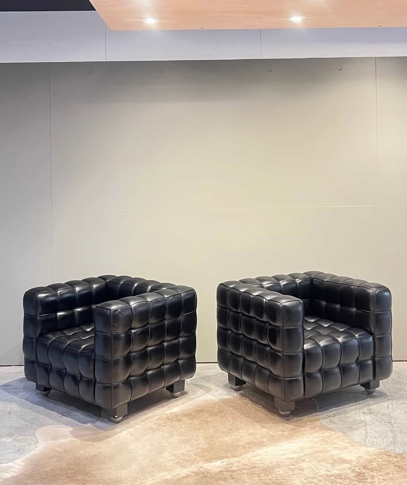 mid century modern black leather lounge chairs.jpeg