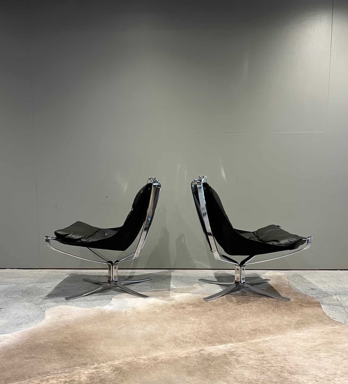 pair of metal falcon chairs.jpg