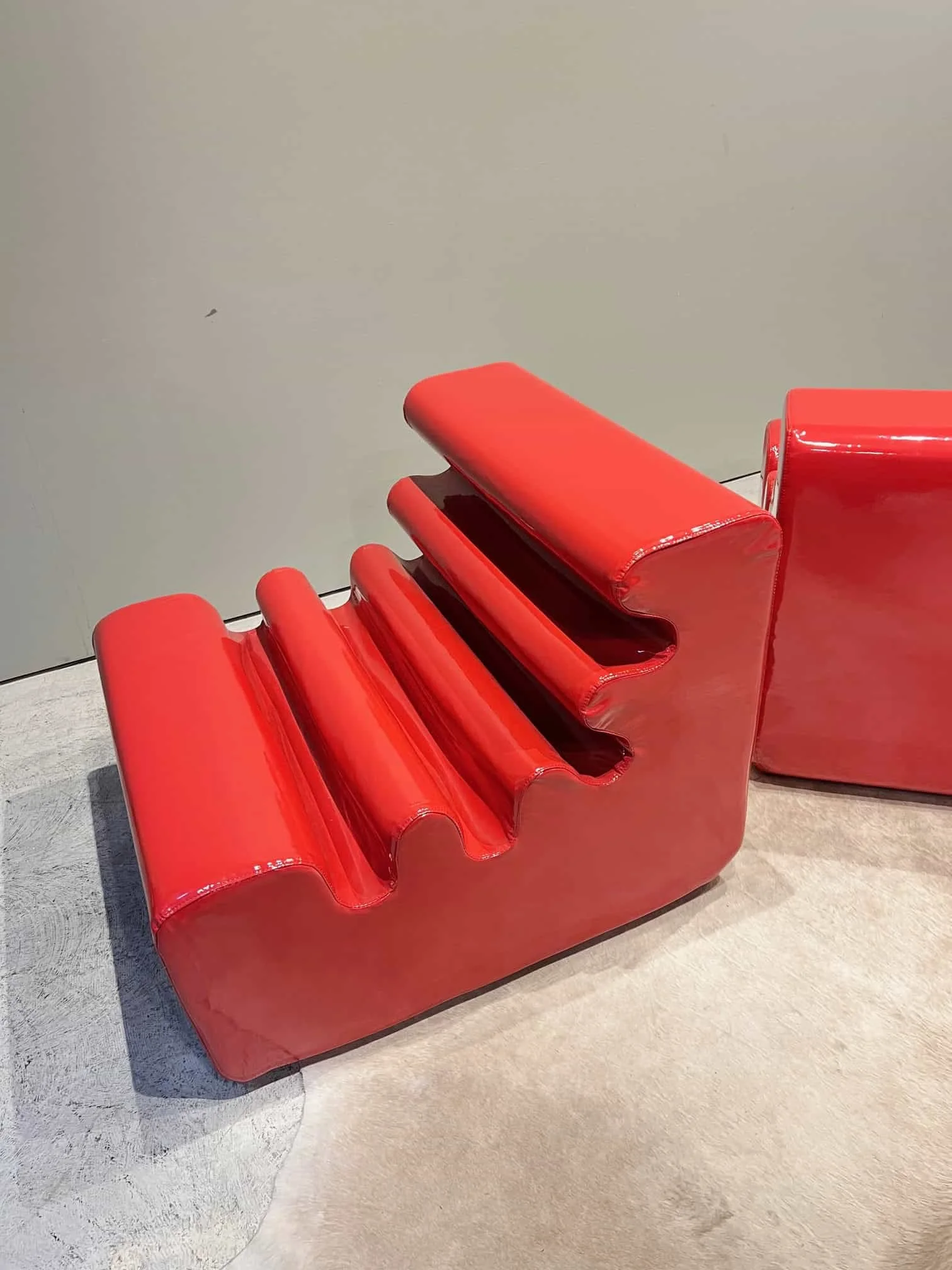red vintage plastic lounge chairs.jpeg