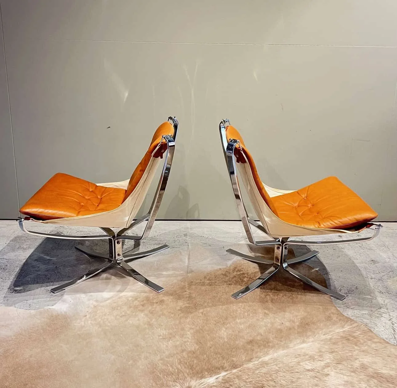 cognac leather danish lounge chairs.jpeg