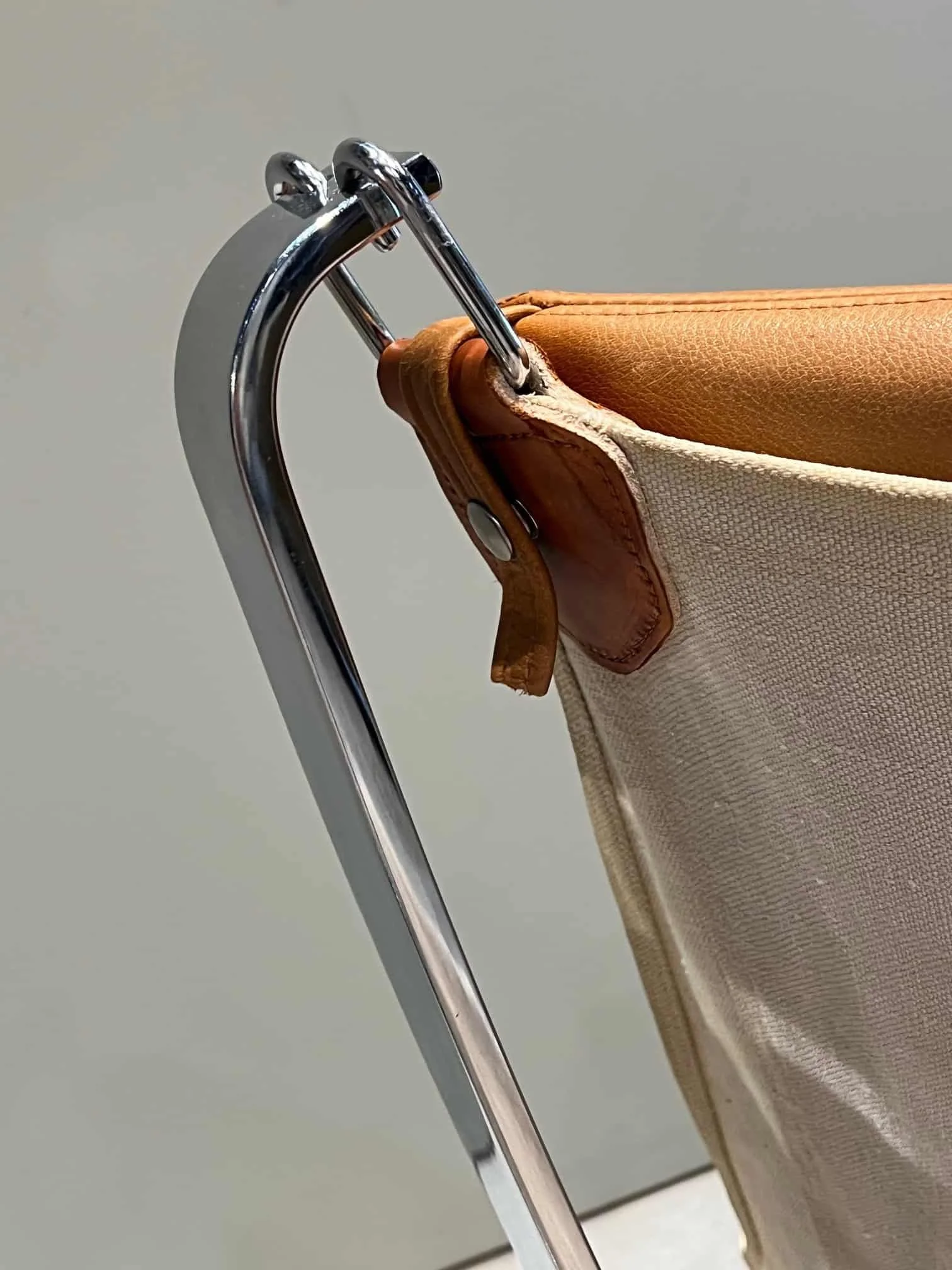 chrome and leather falcon chair.jpeg