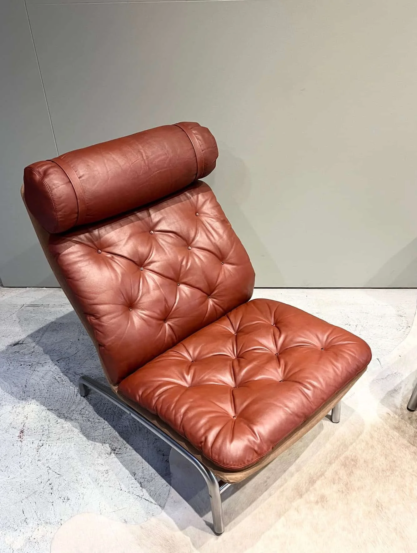 mid century modern chrome and leather lounge chair.jpeg