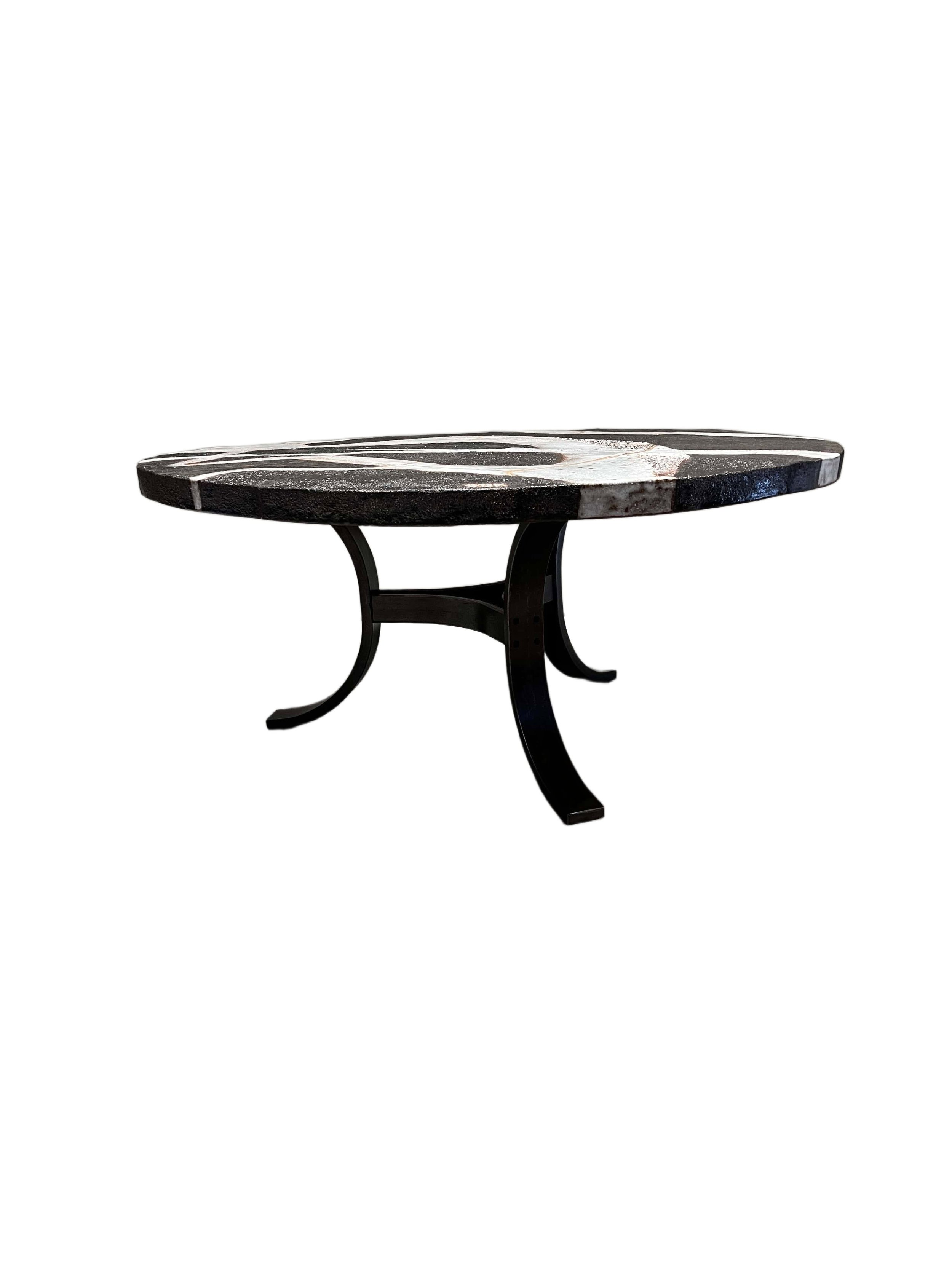 round-ceramic-coffee-table-steel-base-side-view.jpg
