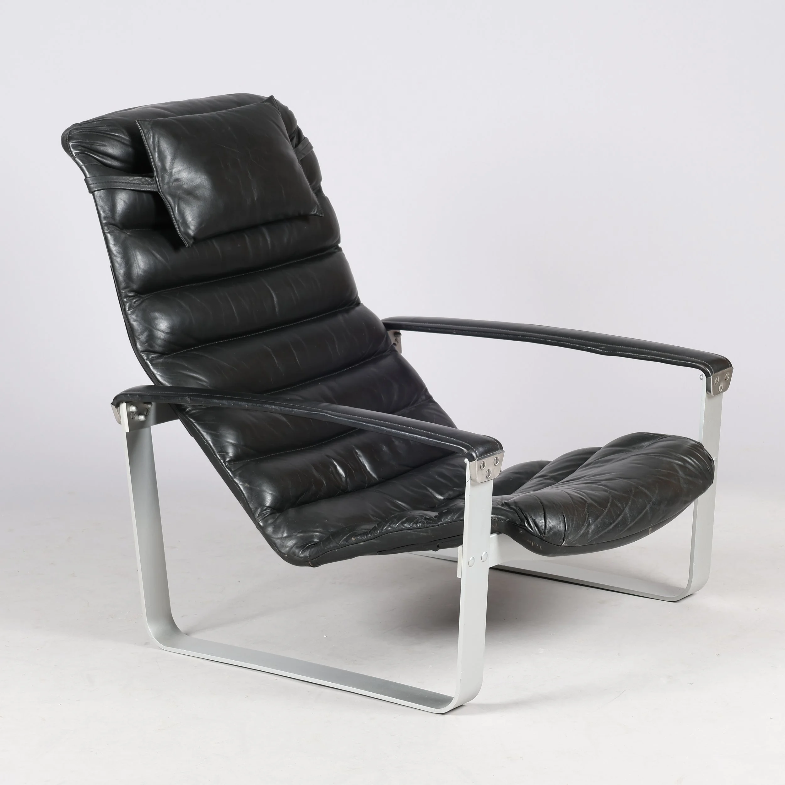 chrome and leather original danish mid century louge chair and footstool