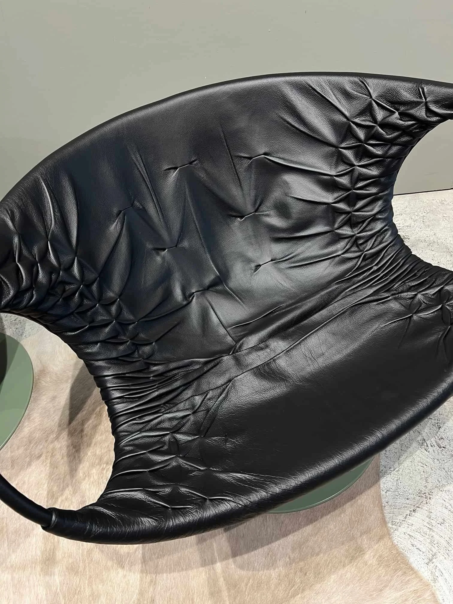 black leather mid century modern italian lounge chair swivel.jpg