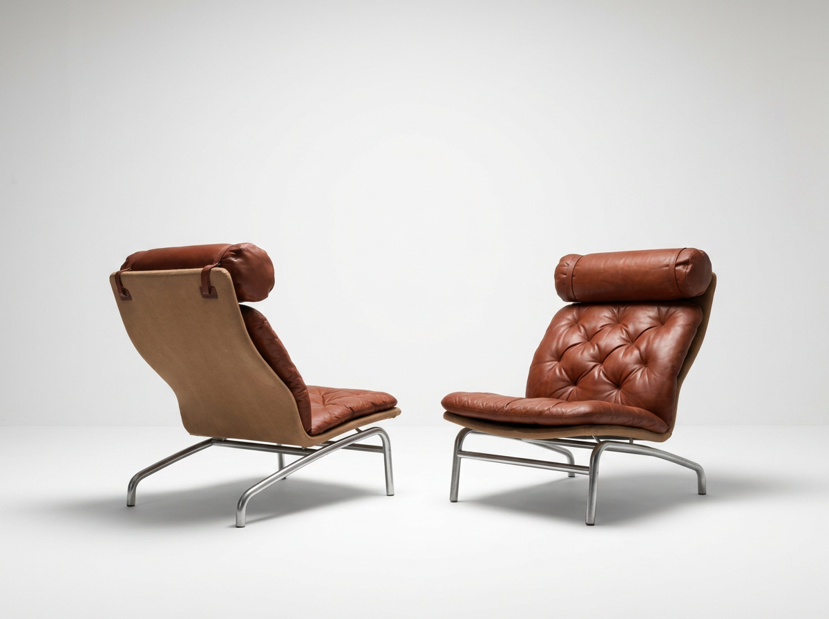 a pair of scandinavian mid century vintage leather lounge chairs for sale