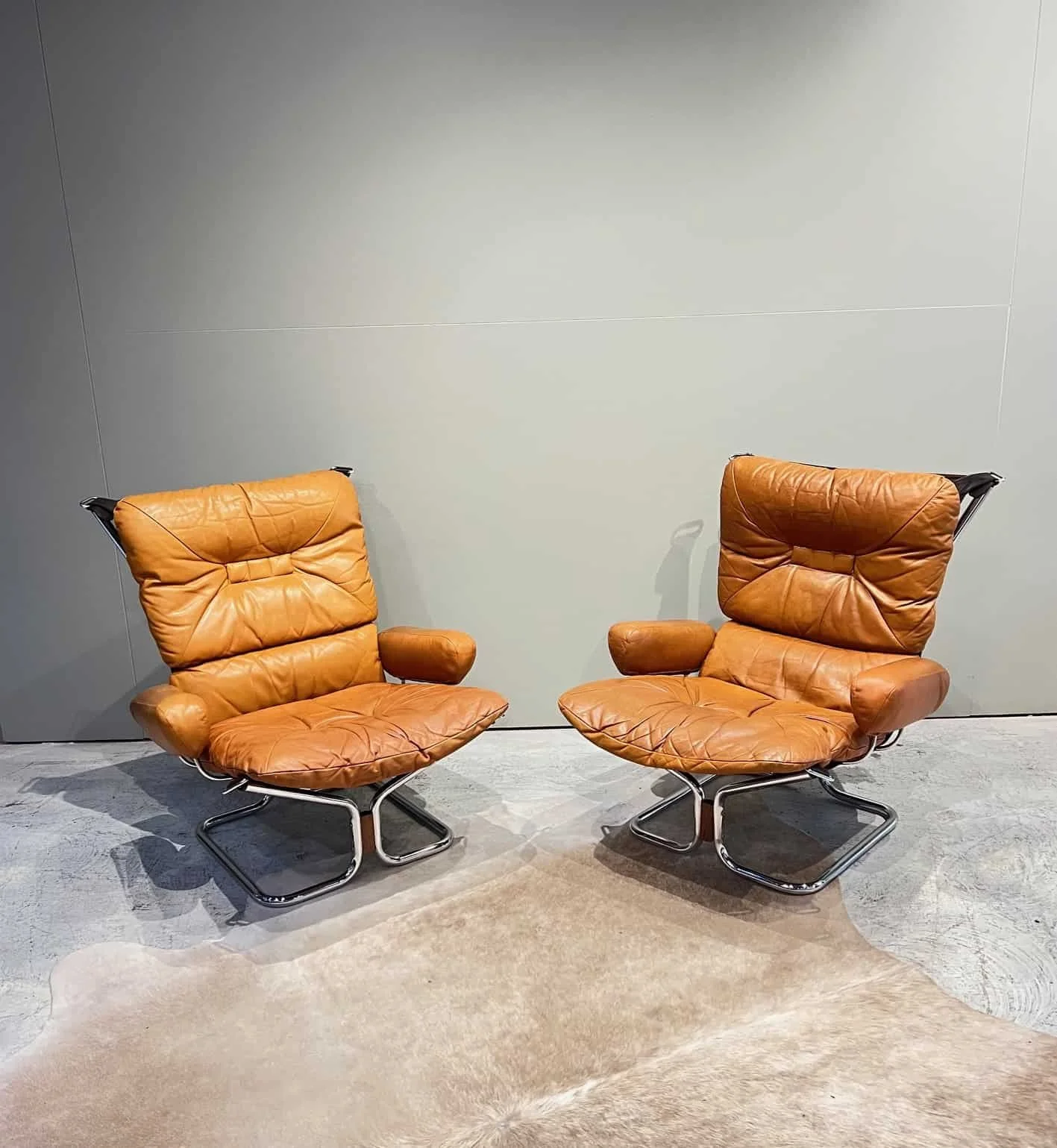 Chrome and Leather mid century scandinavian lounge chairs.jpeg