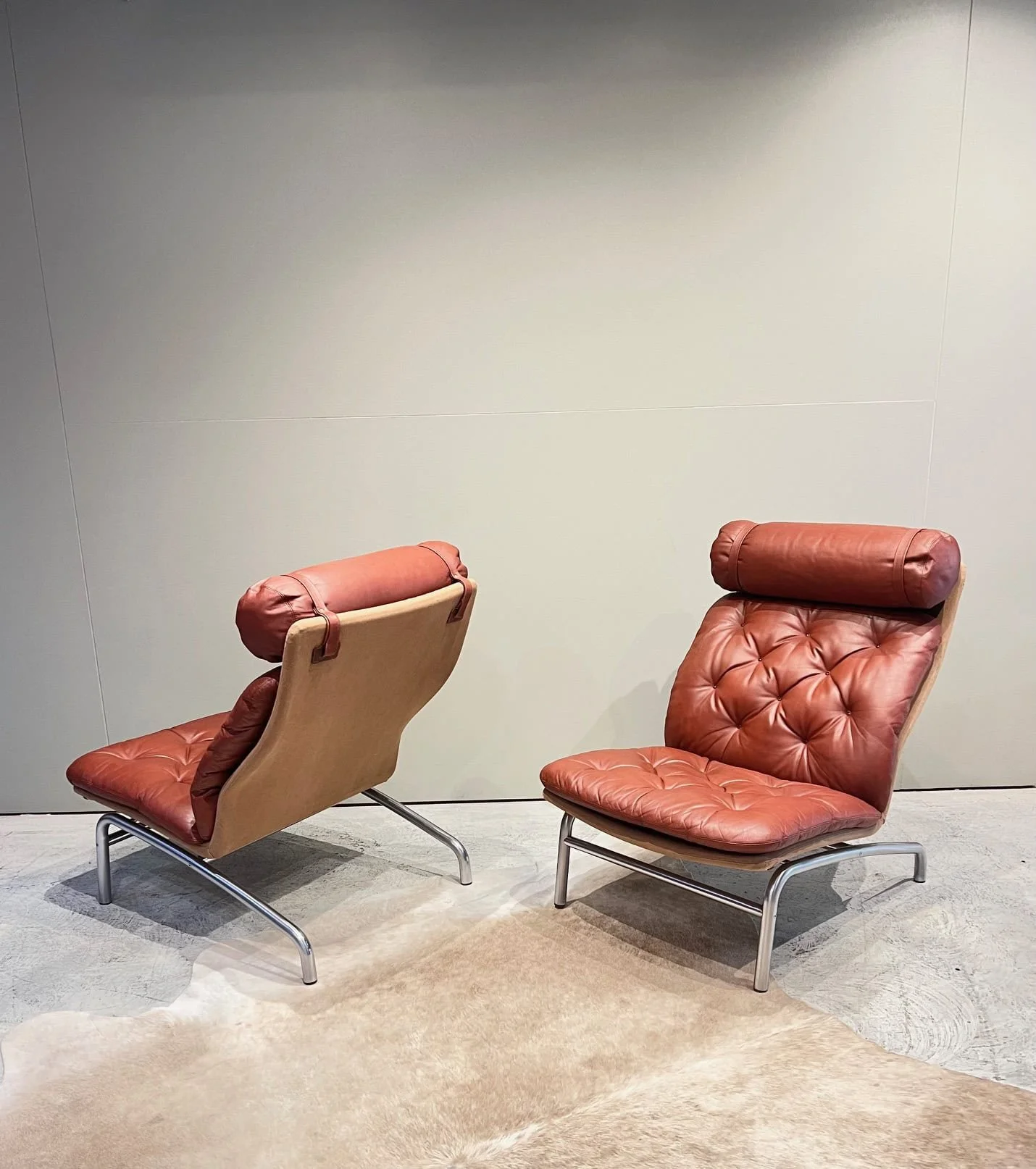 pair of matching chrome and leather scandinavian lounge chairs australia.jpeg