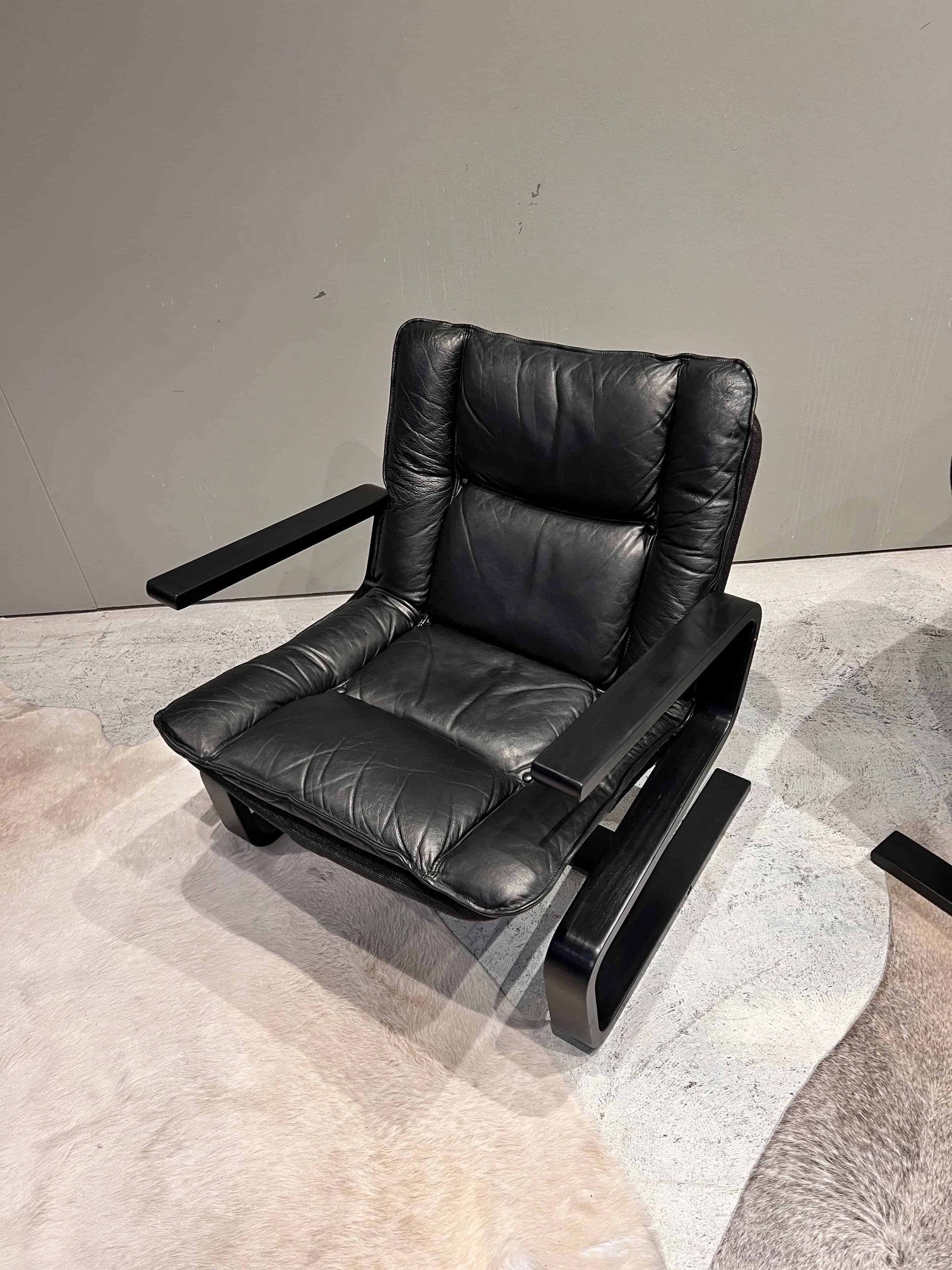 mid-century-scandinavian-black-leather-lounge-chair.jpg