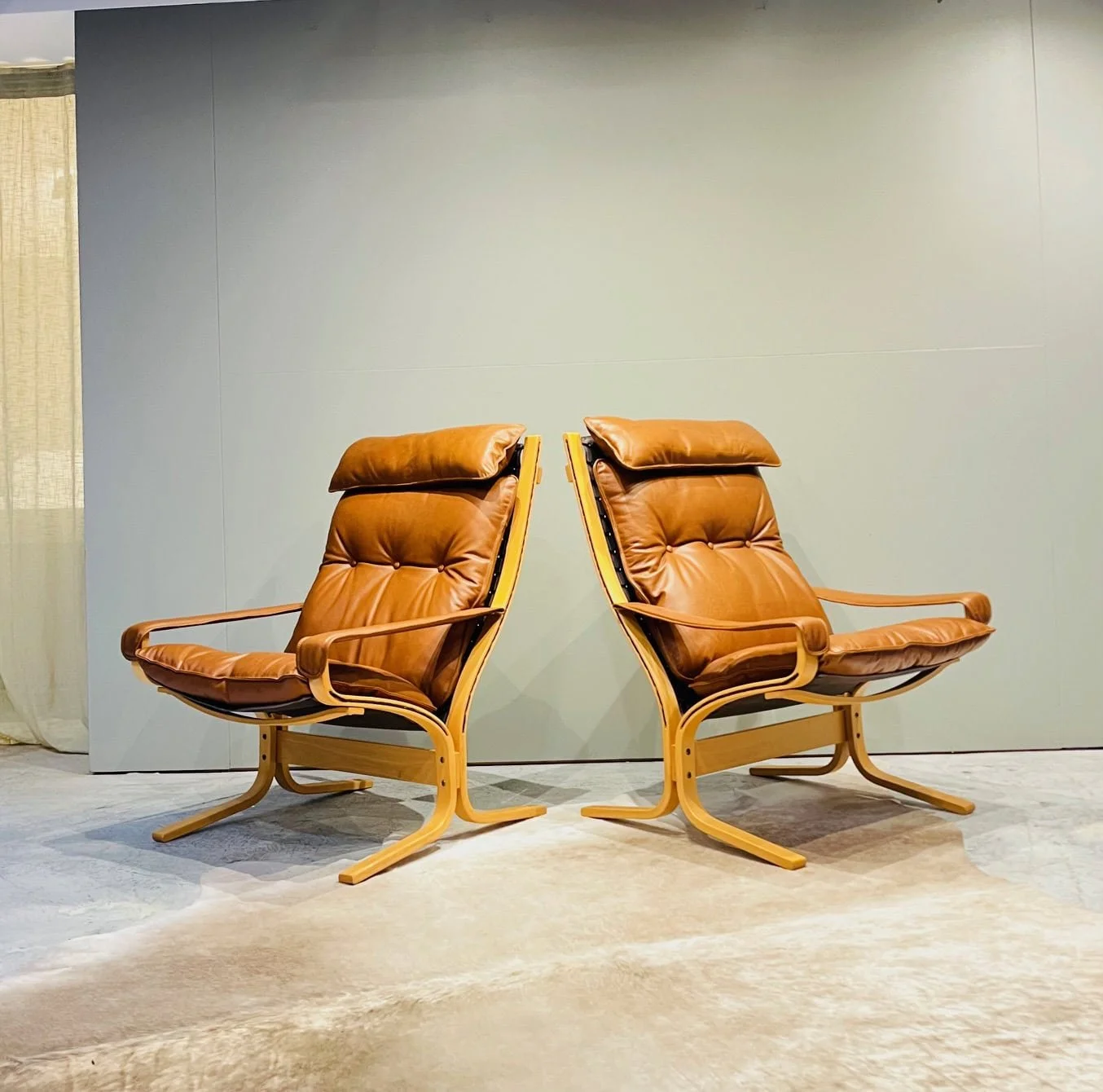 leather mid century modern lounge chairs.jpg