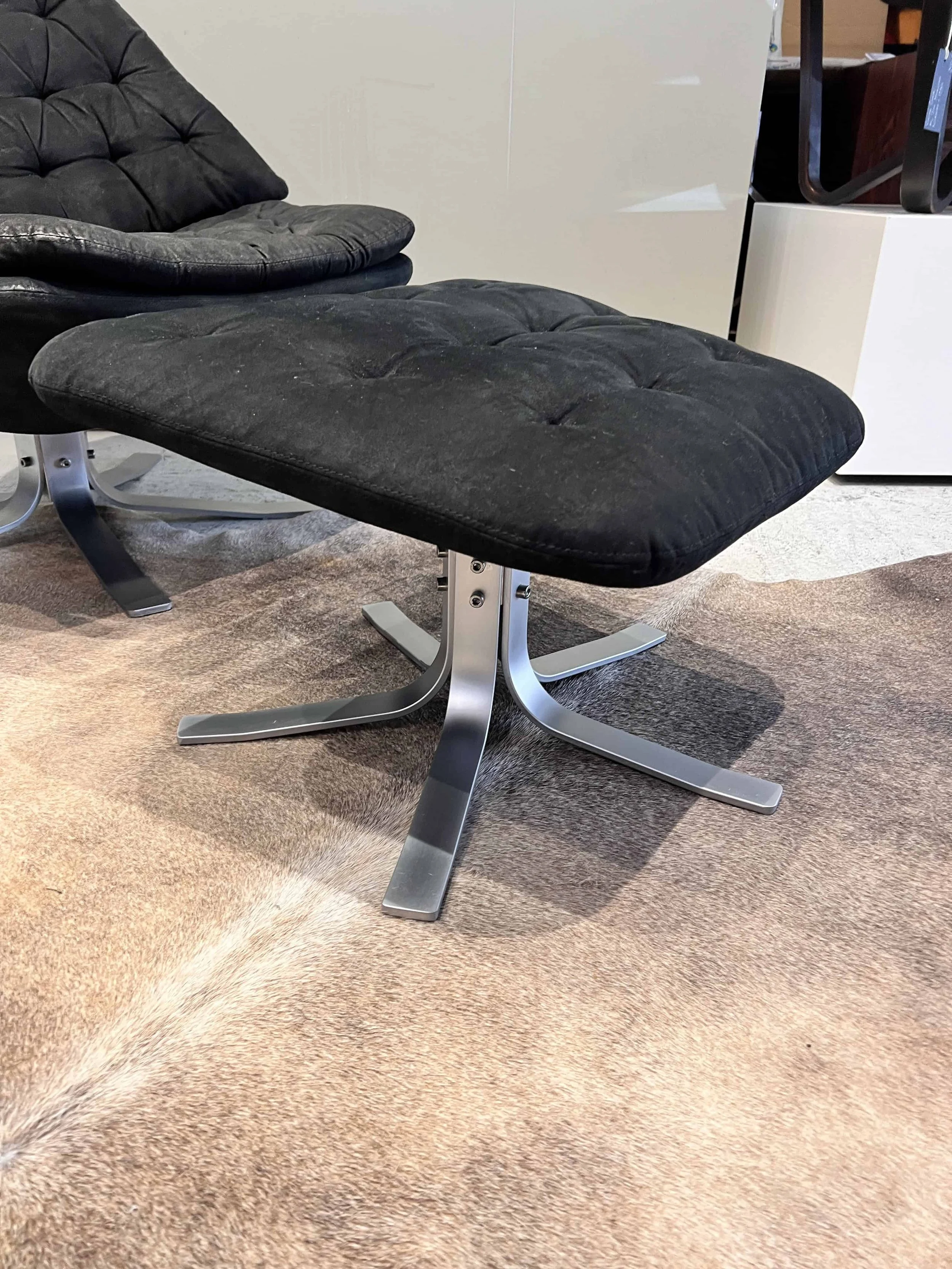m68-footstool-black-tufted-steel-base.jpg