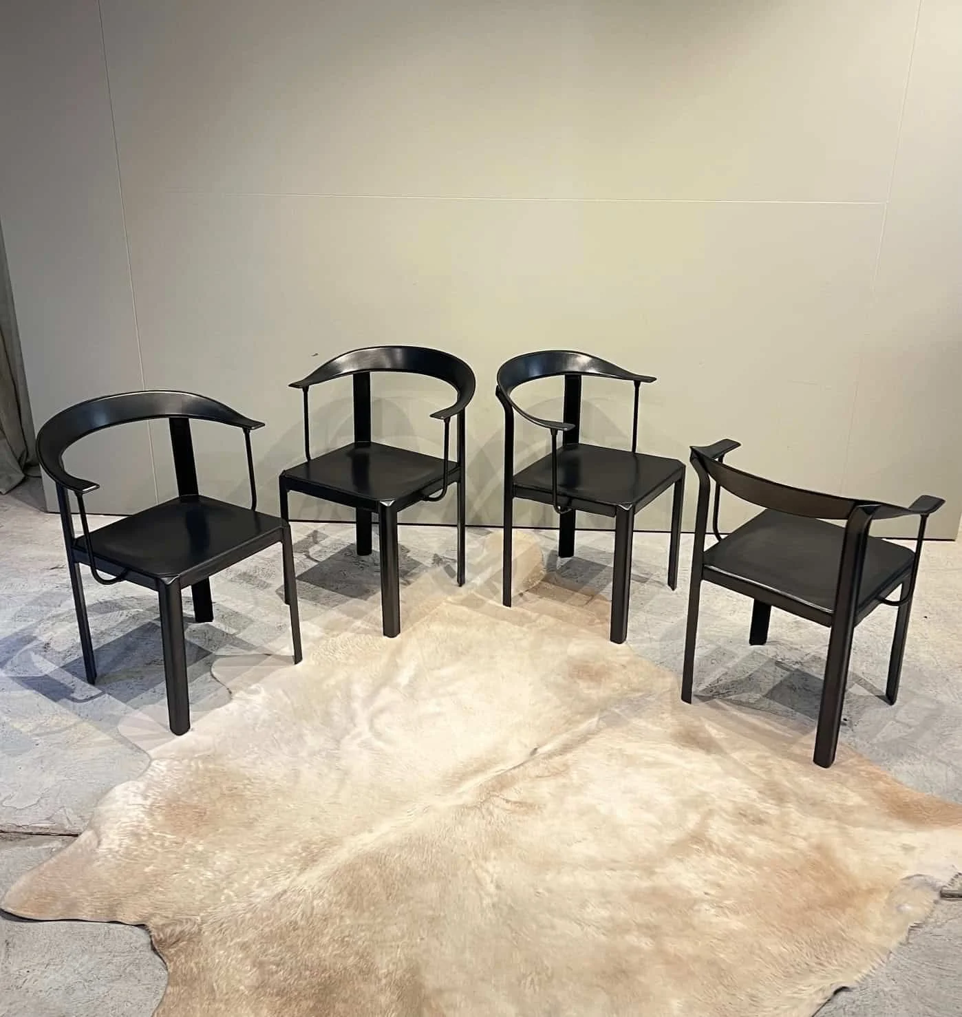 black leather italian dining chairs.jpeg