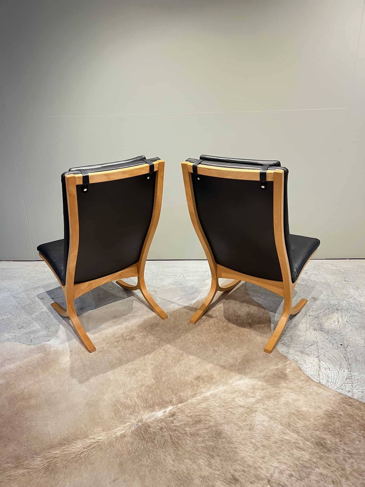 vintage danish leather and wood lounge chairs for sale in sydney.jpeg