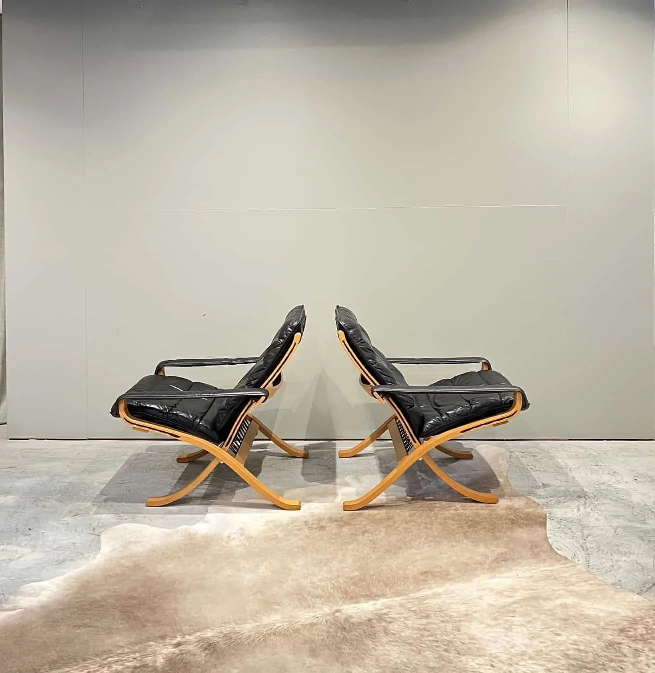 pair of mid century danish lounge chairs.jpg
