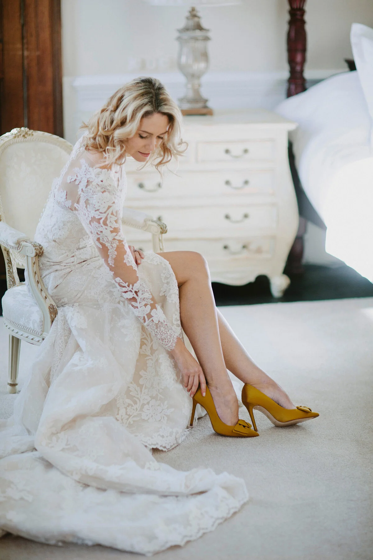 Pronovias-worn-by-a-beautiful-mature-bride-with-yellow-shoes.jpg