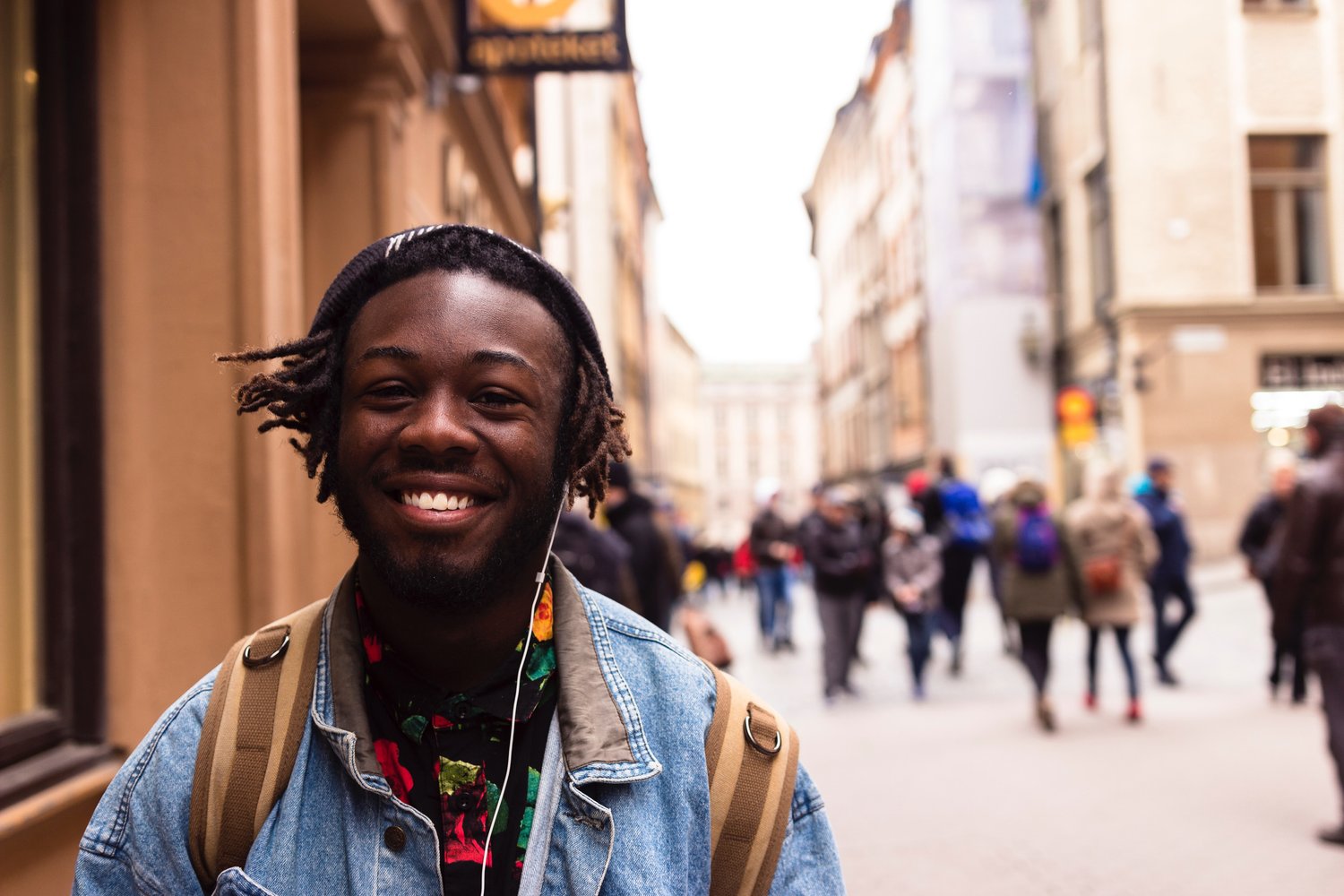 young person smiling at the camera