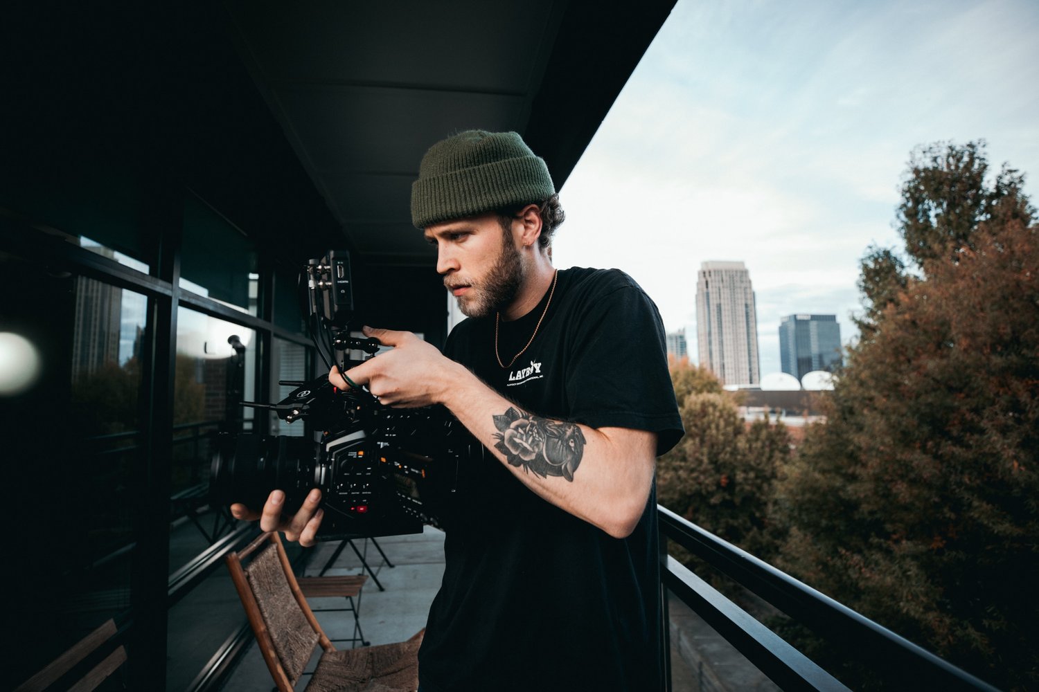 young man with a camera