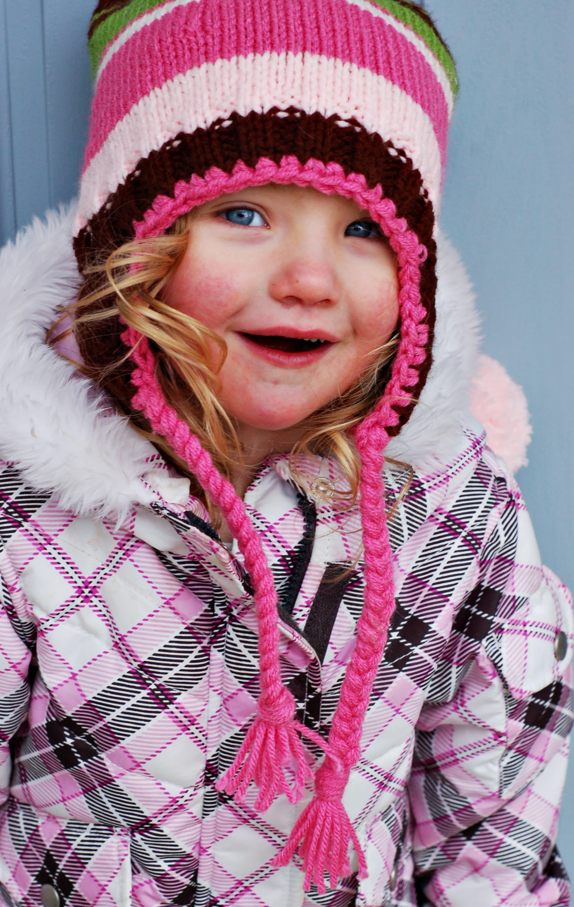 Little girl in pink hat taken by Kim Rodgers Photographer in Denver Colorado