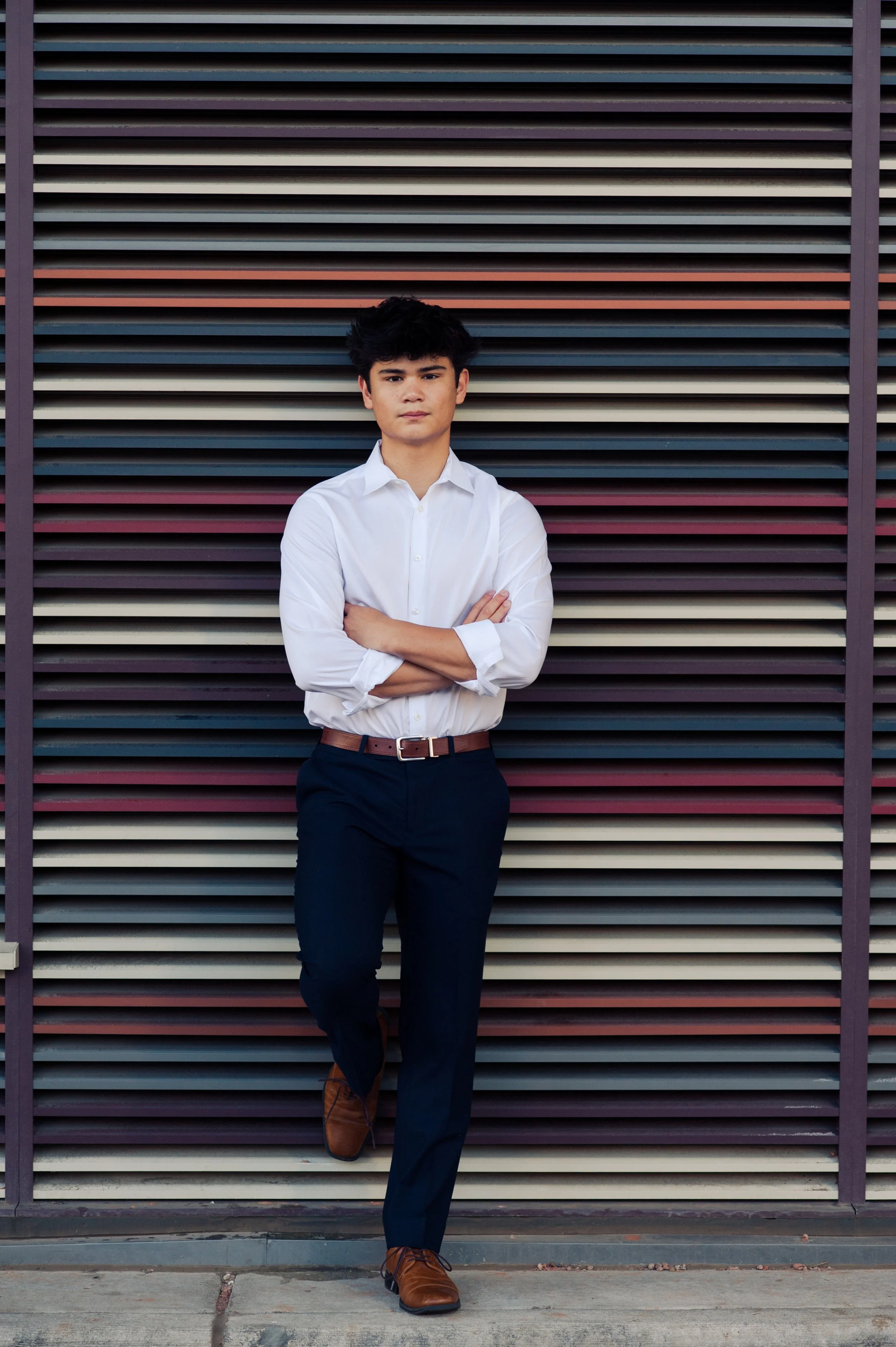 Senior Parker boy poses downtown for portraits