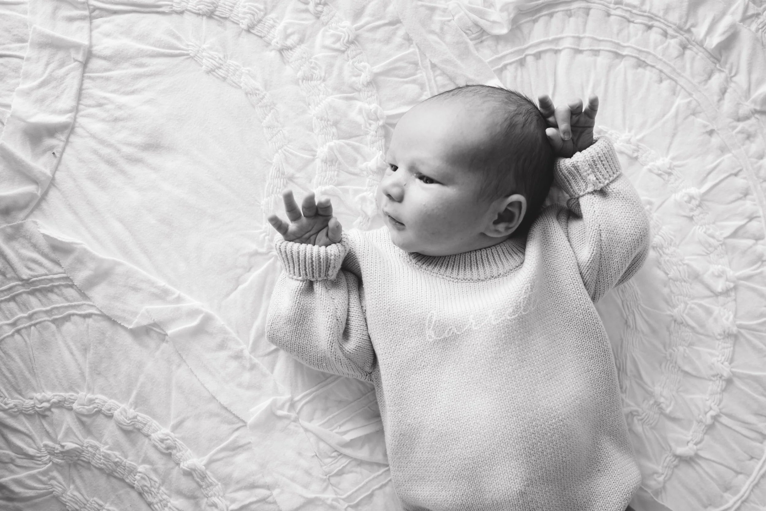 Black and White Photo of a new baby Aurora Colorado In-Home Newborn Photographer